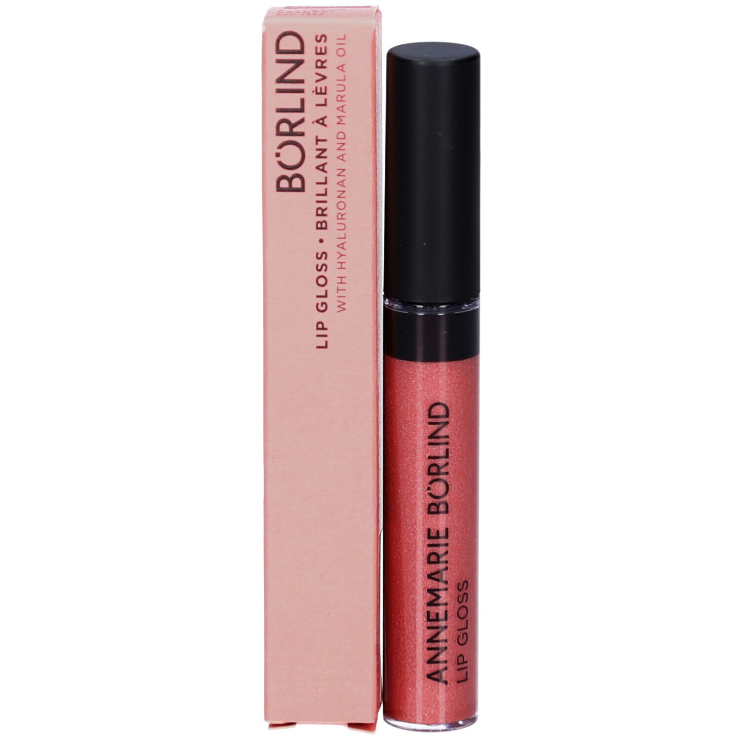 Lipgloss-Tube und Verpackung. Schriftzug: ANNEMARIE BÖRLIND, Lipgloss. Rosa schimmernde Textur.