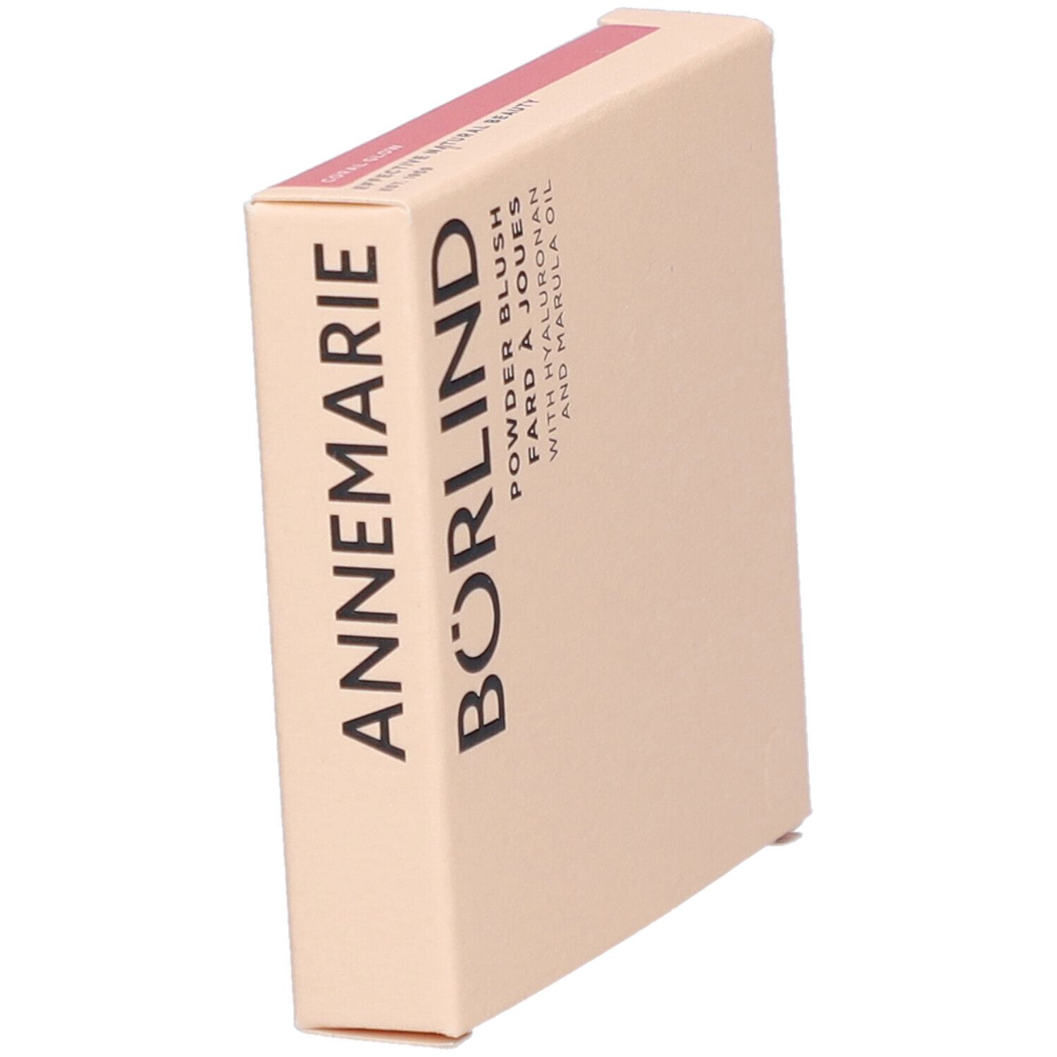 Boîte en carton avec le nom ANNEMARIE BÖRLIND. Inscription : Powder Blush, Fard à Joues, avec Hyaluronan et huile de Marula. Beige et rose.