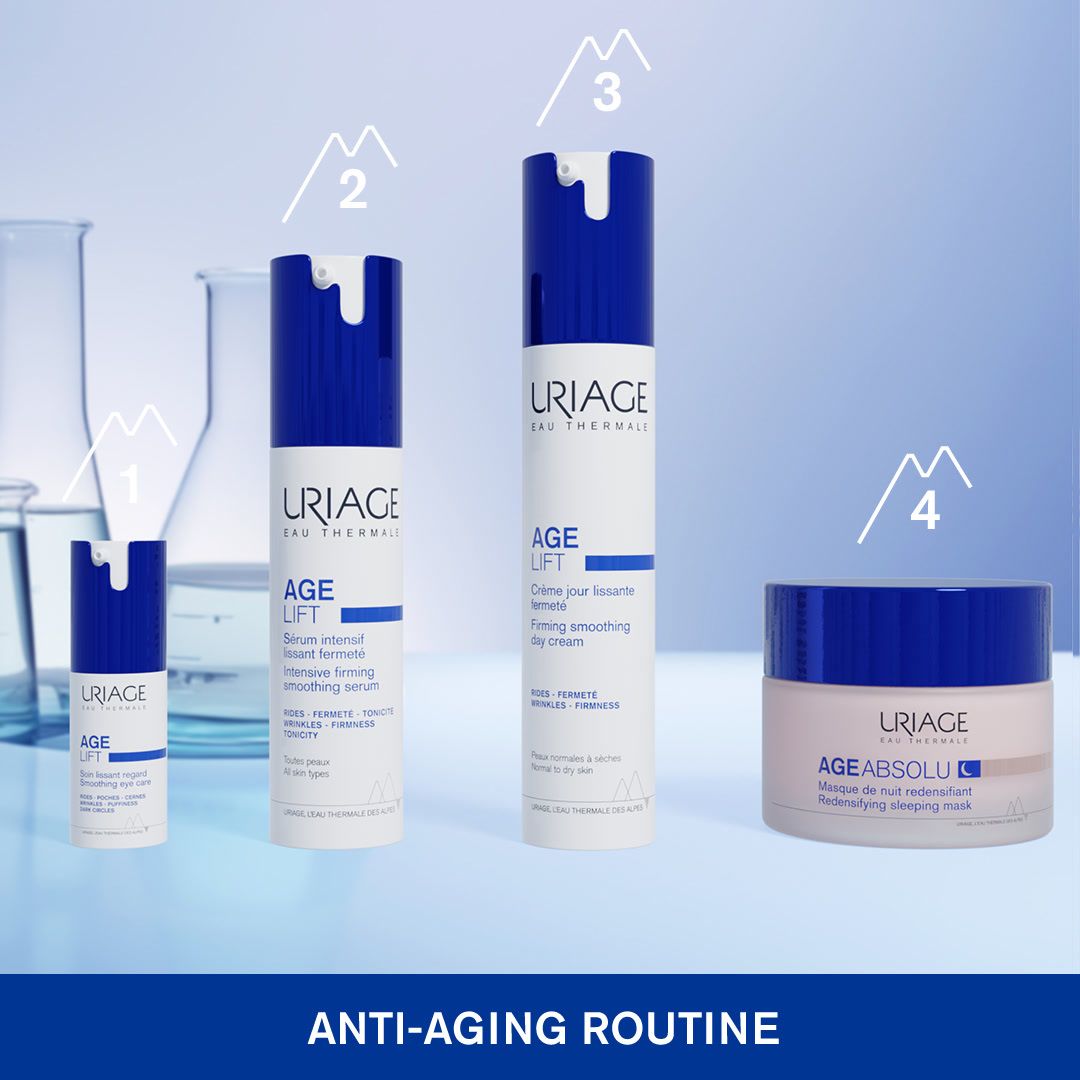 Anti-Aging-Routine. 4 Produkte: Serum, Intensiv-Augenpflege, Tagescreme, Nachtmaske. Uriage Age Lift Produkte mit blauem Deckel.