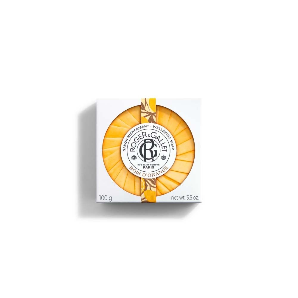 Verpackung mit runder, gelber Seife. Logo und Schriftzug ROGER&GALLET, Bois d'Orange. 100g.