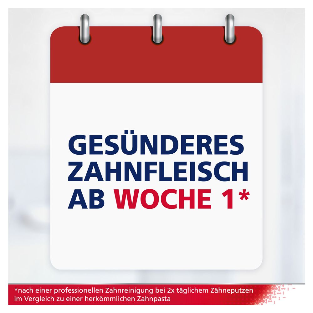 Kalender mit Text: Gesünderes Zahnfleisch ab Woche 1*. Roter Hintergrund.