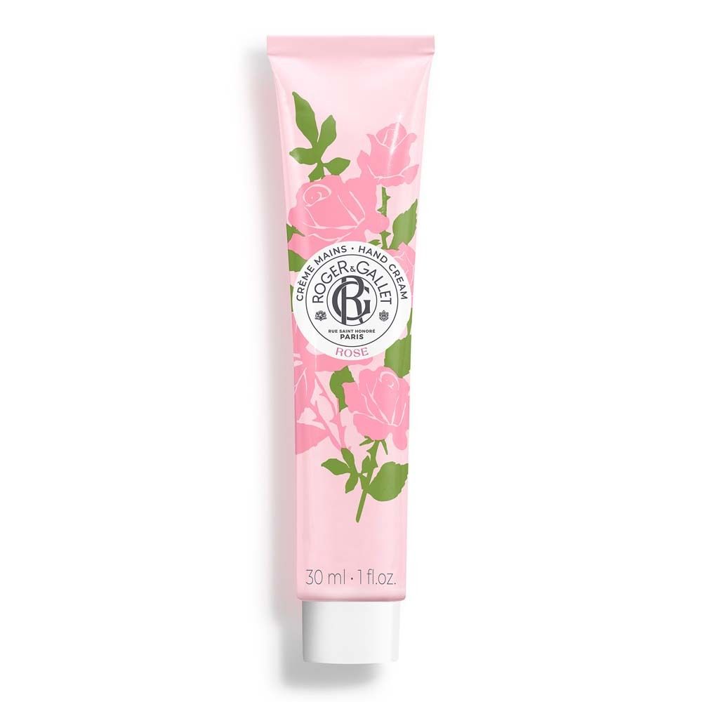 Tube de crème pour les mains rose. Décor de roses et feuilles. Logo et texte: ROGER&GALLET, Rose, Crème Mains Hand Cream. Ouverture blanche.