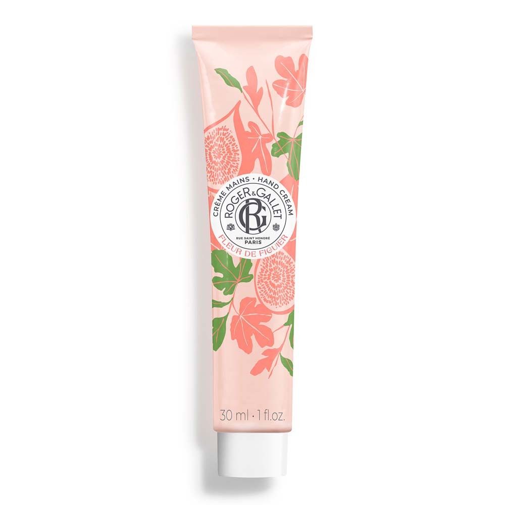 Tube de crème pour les mains rose avec motif floral. Logo et texte 'Fleur de Figuier' visibles. Contenance de 30 ml.