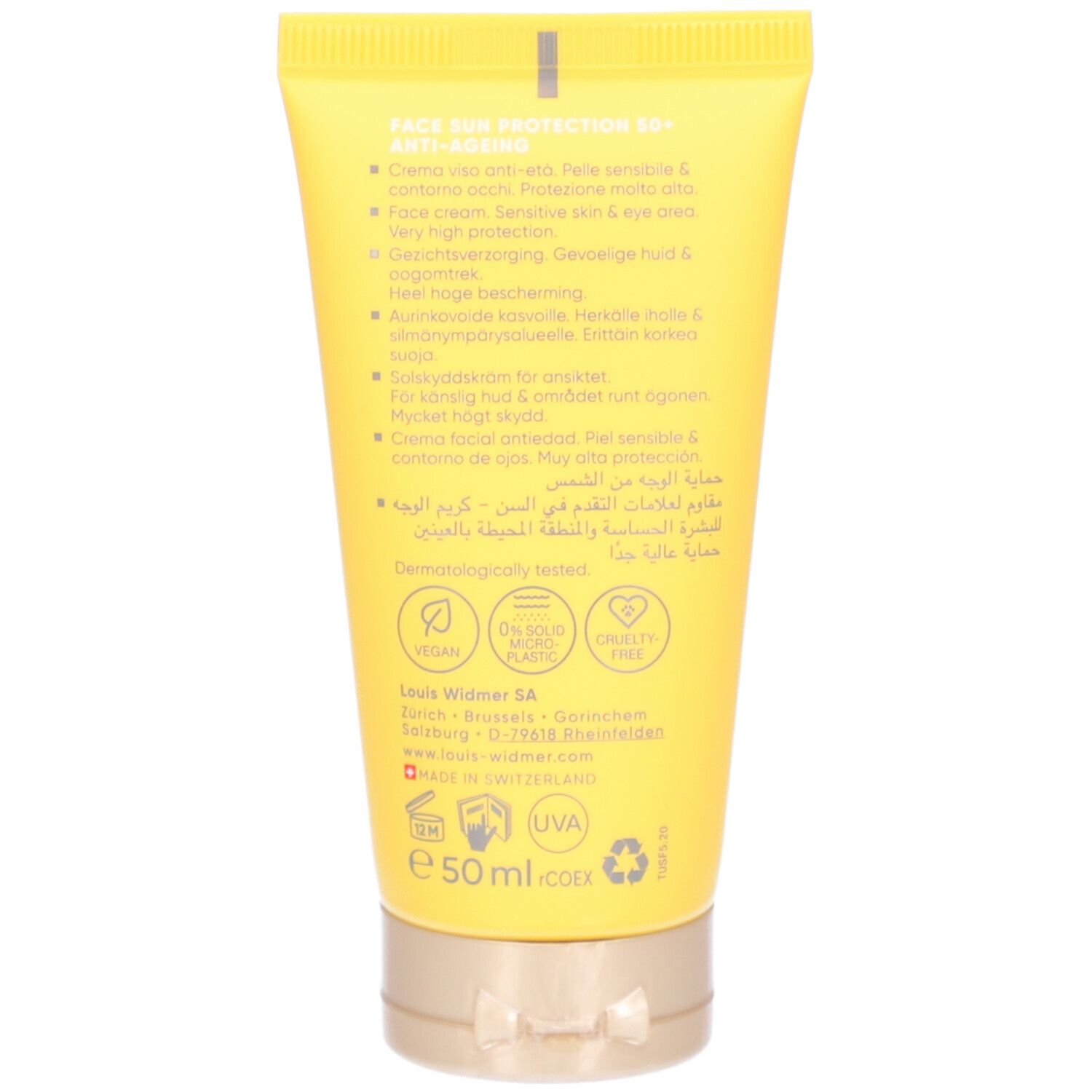 Dos d'un tube de crème solaire jaune. Texte en plusieurs langues. Contient des informations sur les ingrédients et les certifications.