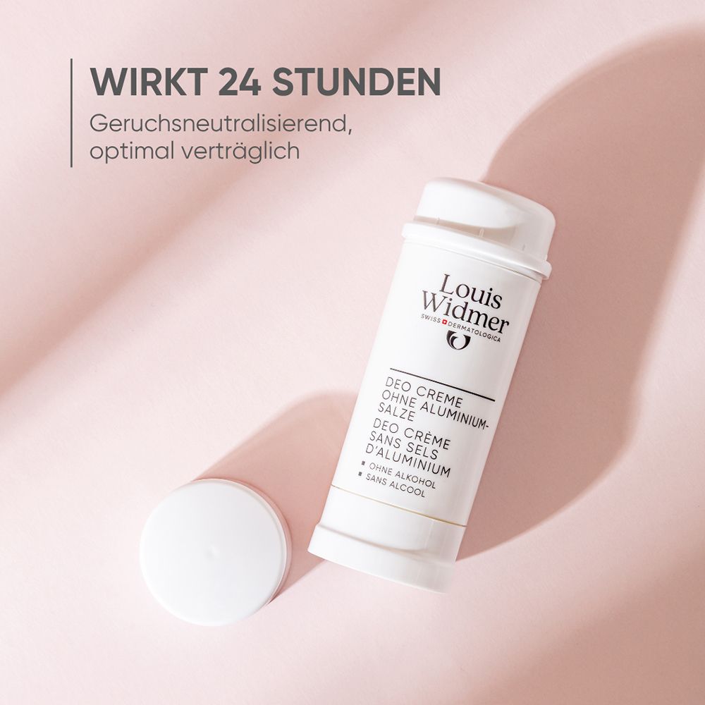 Weiße Deocreme-Tube von Louis Widmer mit offenem Deckel daneben. Text: "Wirkt 24 Stunden".