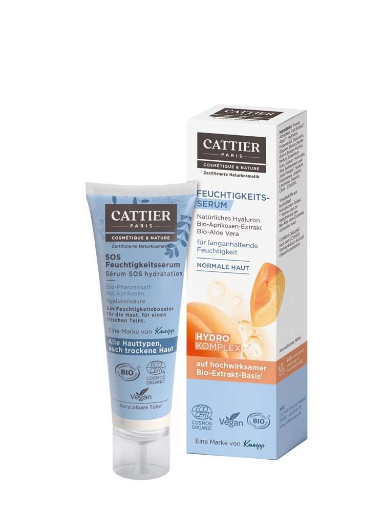 Cattier Feuchtigkeits-Serum in Tube und Karton. Blaue Tube mit weißer Schrift. Karton mit Produktinformationen und Aprikosen-Illustration.