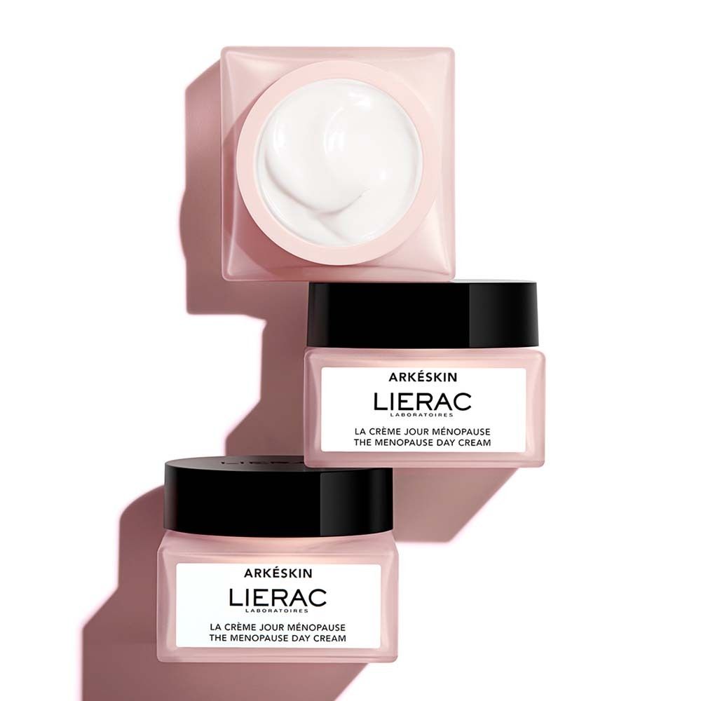 Trois pots avec couvercle noir. Inscription: Arkéskin, LIERAC, La Crème Jour Ménopause, The Menopause Day Cream.