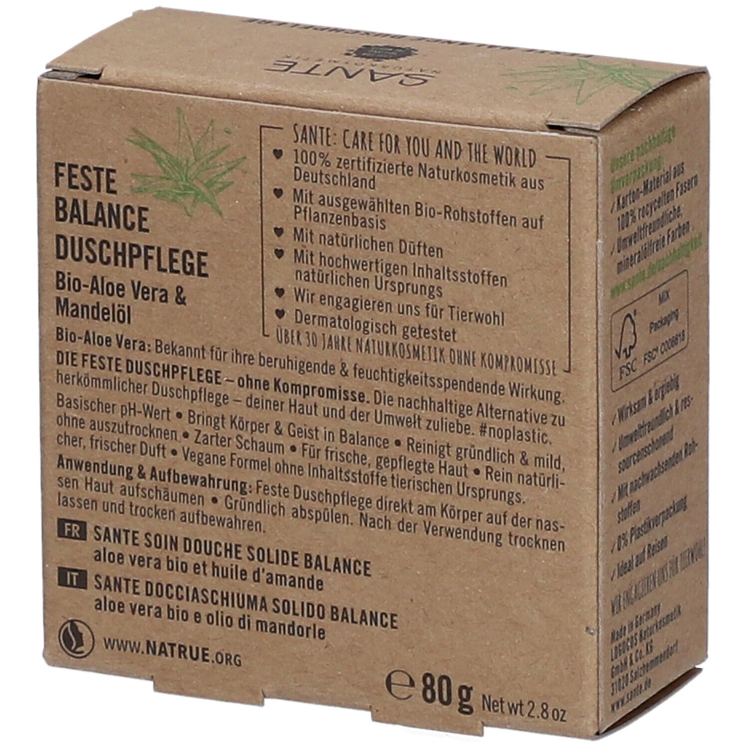 Emballage en carton, marron avec accents verts. Texte: SANTE, Feste Balance Duschpflege. Mentions: Vegan, Bio. Texte et ingrédients au dos.