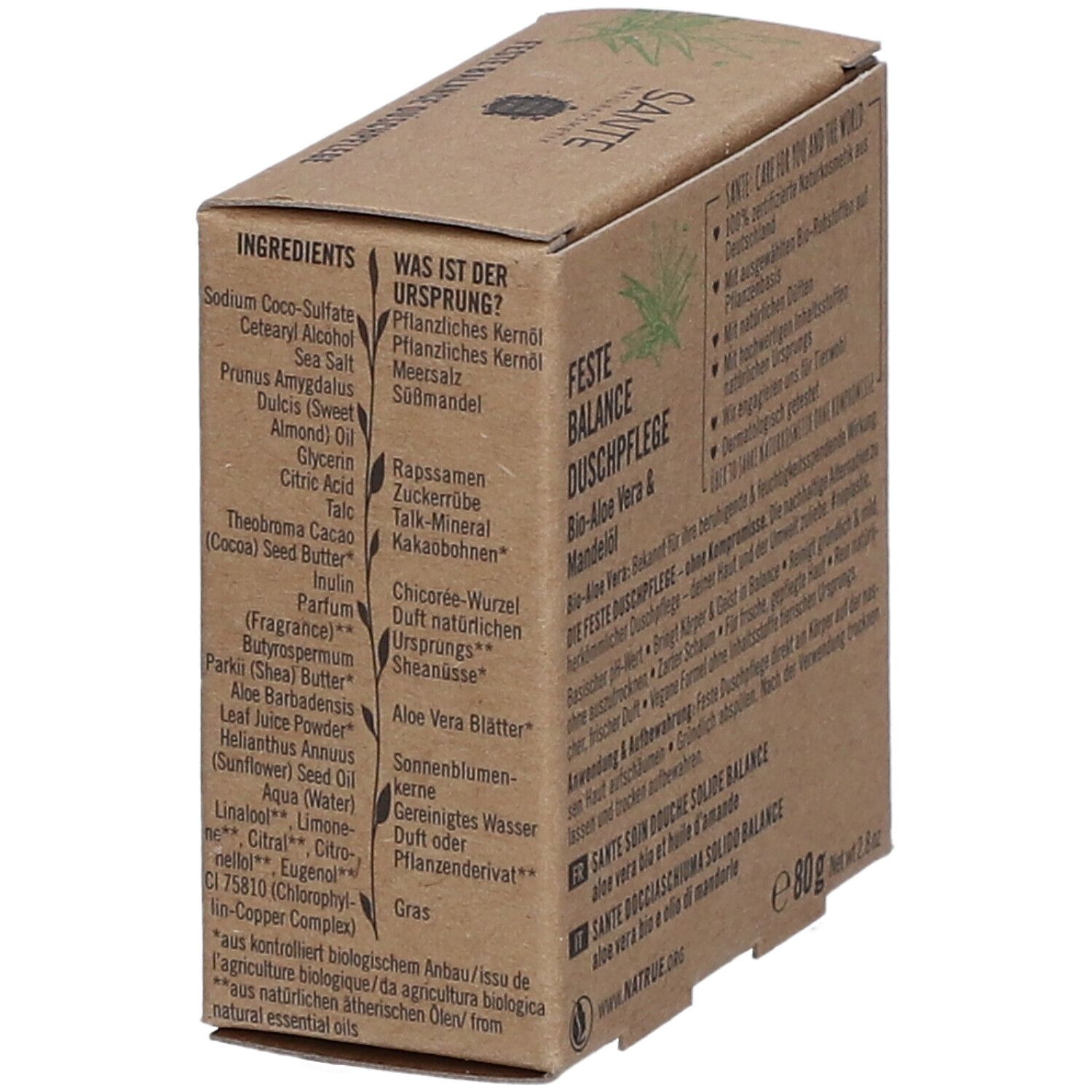 Emballage en carton, marron avec accents verts. Texte: SANTE, Feste Balance Duschpflege. Mentions: Ingrédients. Texte au dos.
