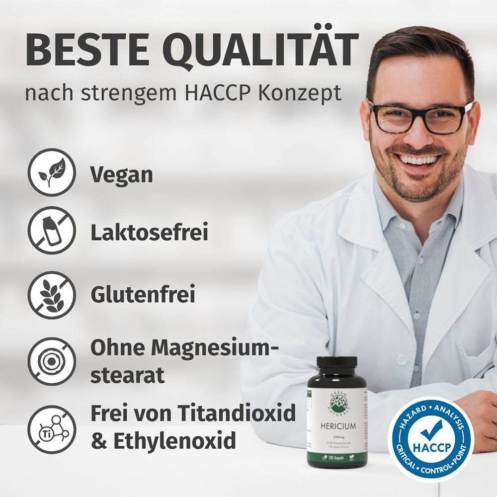 Mann im Laborkittel neben Dose HERICIUM. "Beste Qualität" nach HACCP. Vegan, Laktosefrei, Glutenfrei.