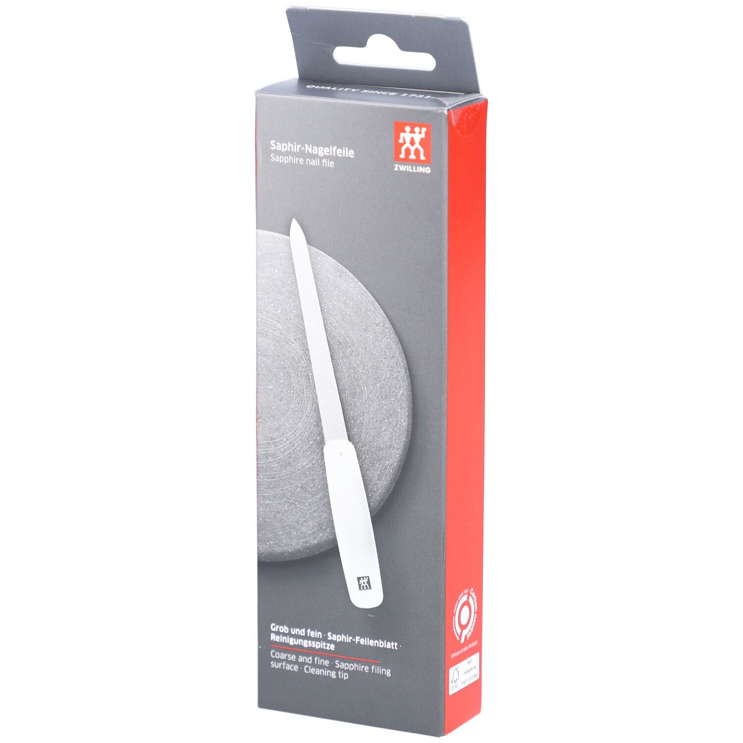 Emballage de la lime à ongles ZWILLING Saphir. Manche blanc, surface de limage grise. Inscription : Saphir-Nagelfeile, logo ZWILLING. Grossier et fin.