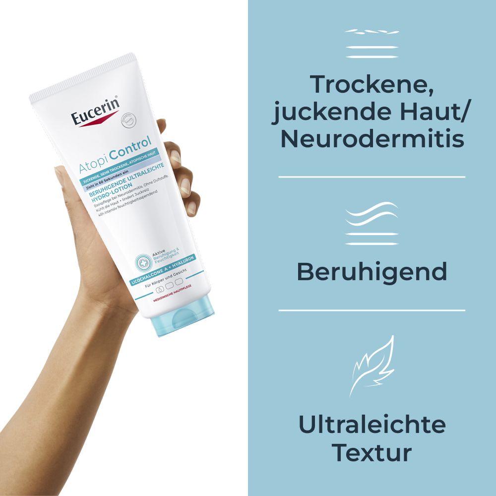 Hand hält Tube Eucerin AtopiControl Hydro-Lotion. Text: trockene Haut, beruhigend, ultraleichte Textur.