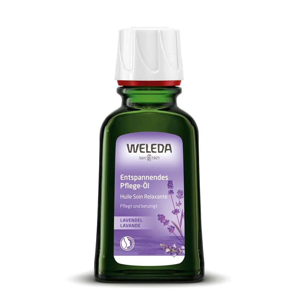 Grüne Glasflasche mit Pflegeöl. Weißer Deckel. Lila Etikett mit Lavendel-Motiv. Marke WELEDA.
