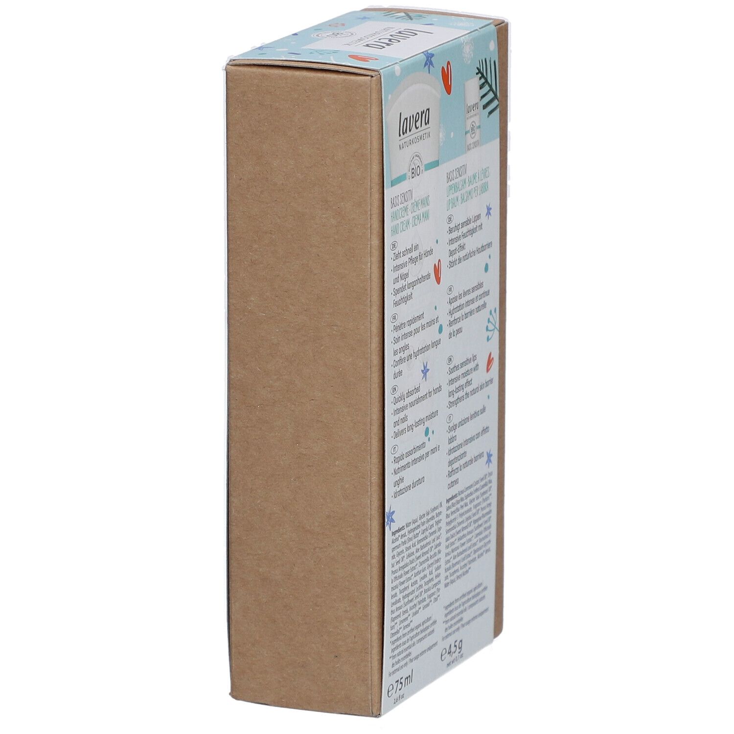 Vue latérale de la boîte 'Winter Essentials' lavera. Texte en allemand, français, italien. Crème mains et baume à lèvres.