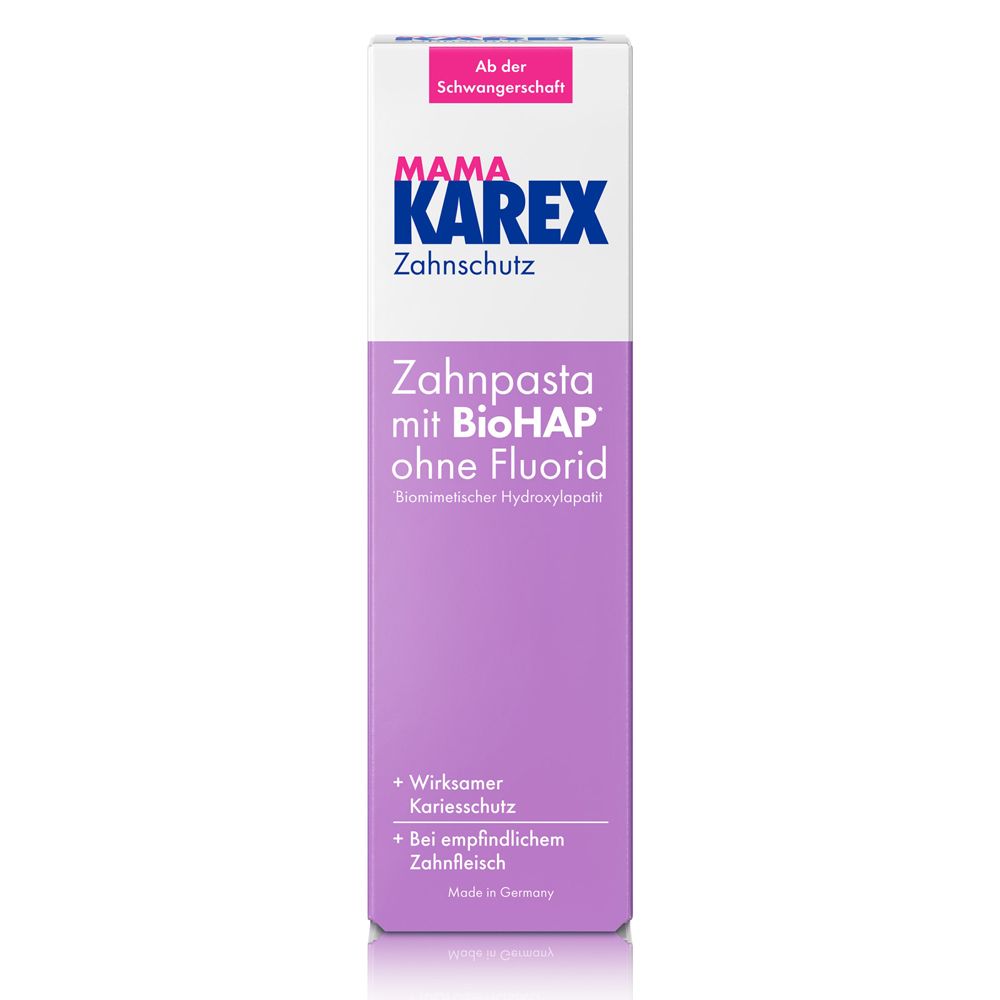 Boîte. Inscription : MAMA KAREX Zahnschutz. Texte : Zahnpasta mit BioHAP ohne Fluorid. Fond violet.