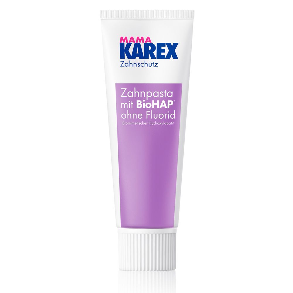 Tube de dentifrice. Inscription : MAMA KAREX Zahnschutz. Texte : Zahnpasta mit BioHAP ohne Fluorid.