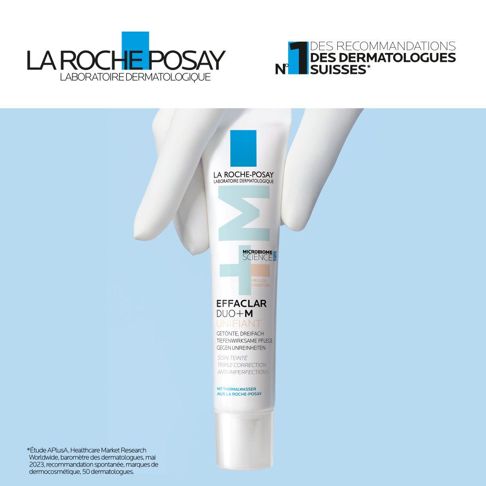 La Roche-Posay Effaclar Duo+M getönt. Tube wird von Hand gehalten. Logo und Text.