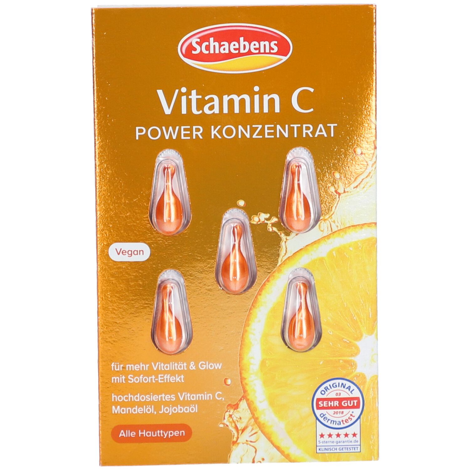 Boîte de concentré de vitamine C en capsules. Capsules orangées en blister. Label végétalien.