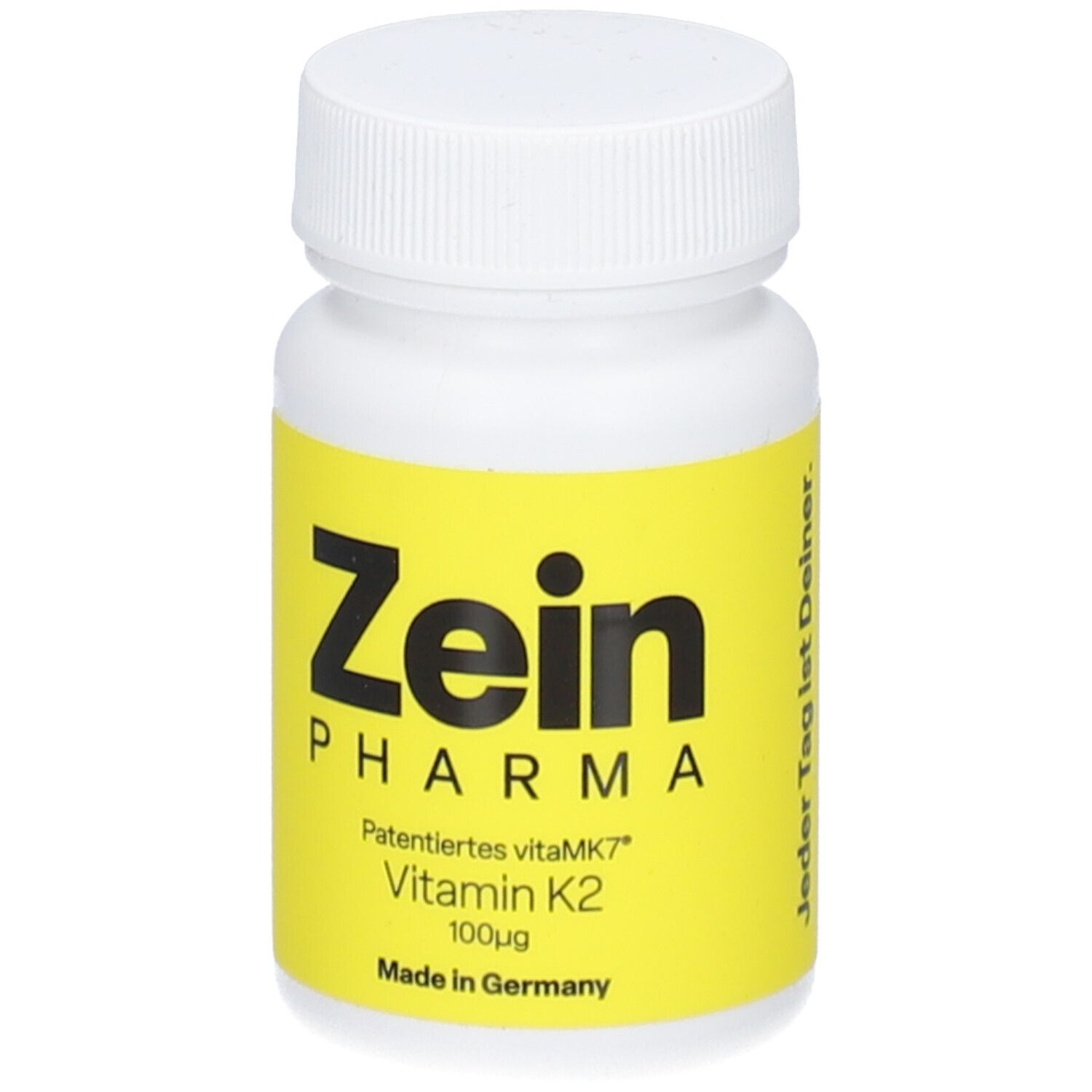 Flacon blanc avec étiquette jaune. Inscription: Zein Pharma, Vitamine K2 100µg, Fabriqué en Allemagne. Texte: Chaque jour est le vôtre.