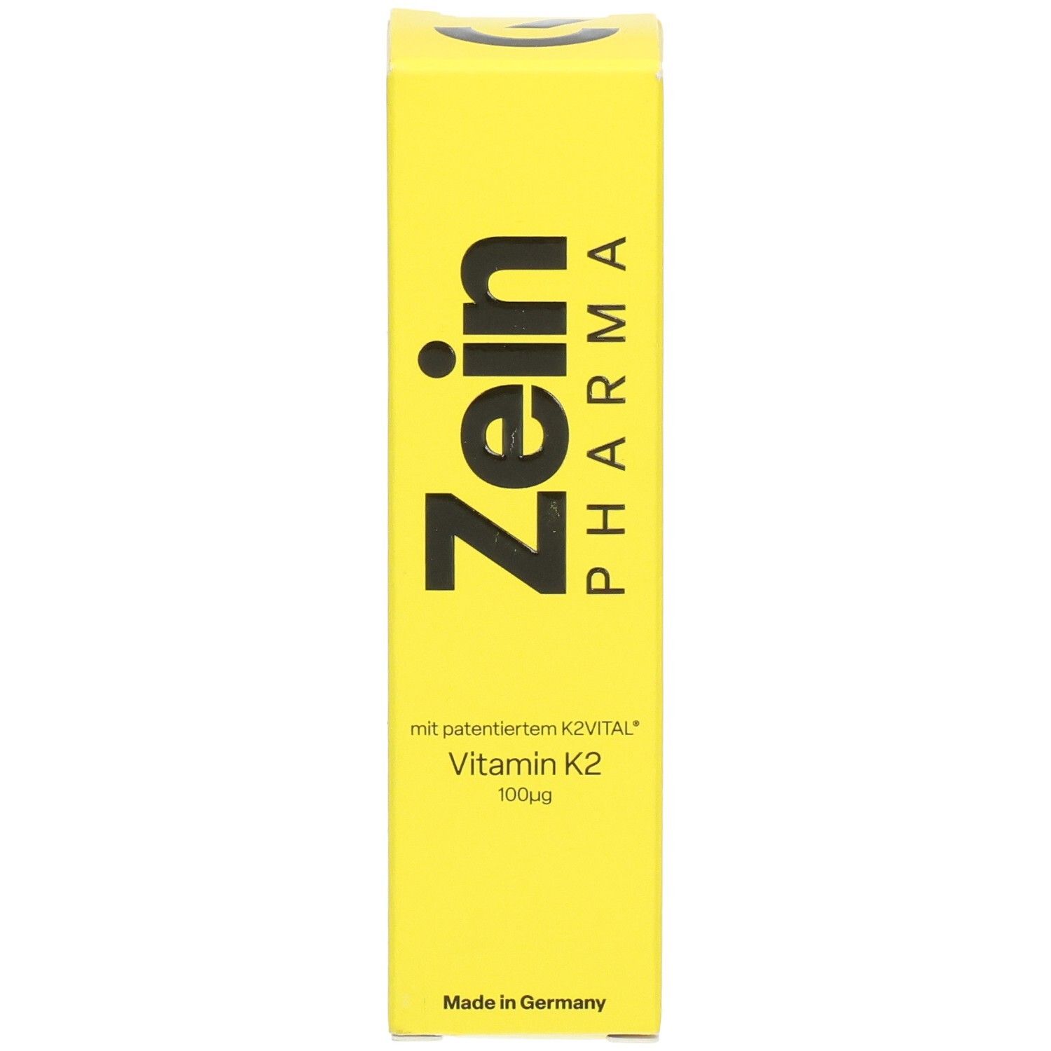 Gelbe Schachtel mit schwarzem Zein Pharma Logo und Text. Enthält Vitamin K2 100µg. Hergestellt in Deutschland.