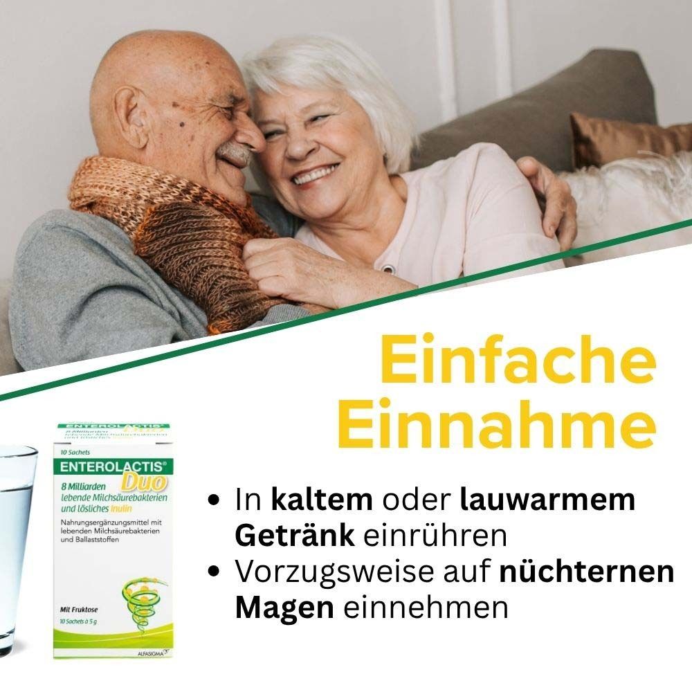Couple âgé souriant. Boîte Enterolactis Duo. Texte: Prise facile. Dans une boisson froide ou tiède.