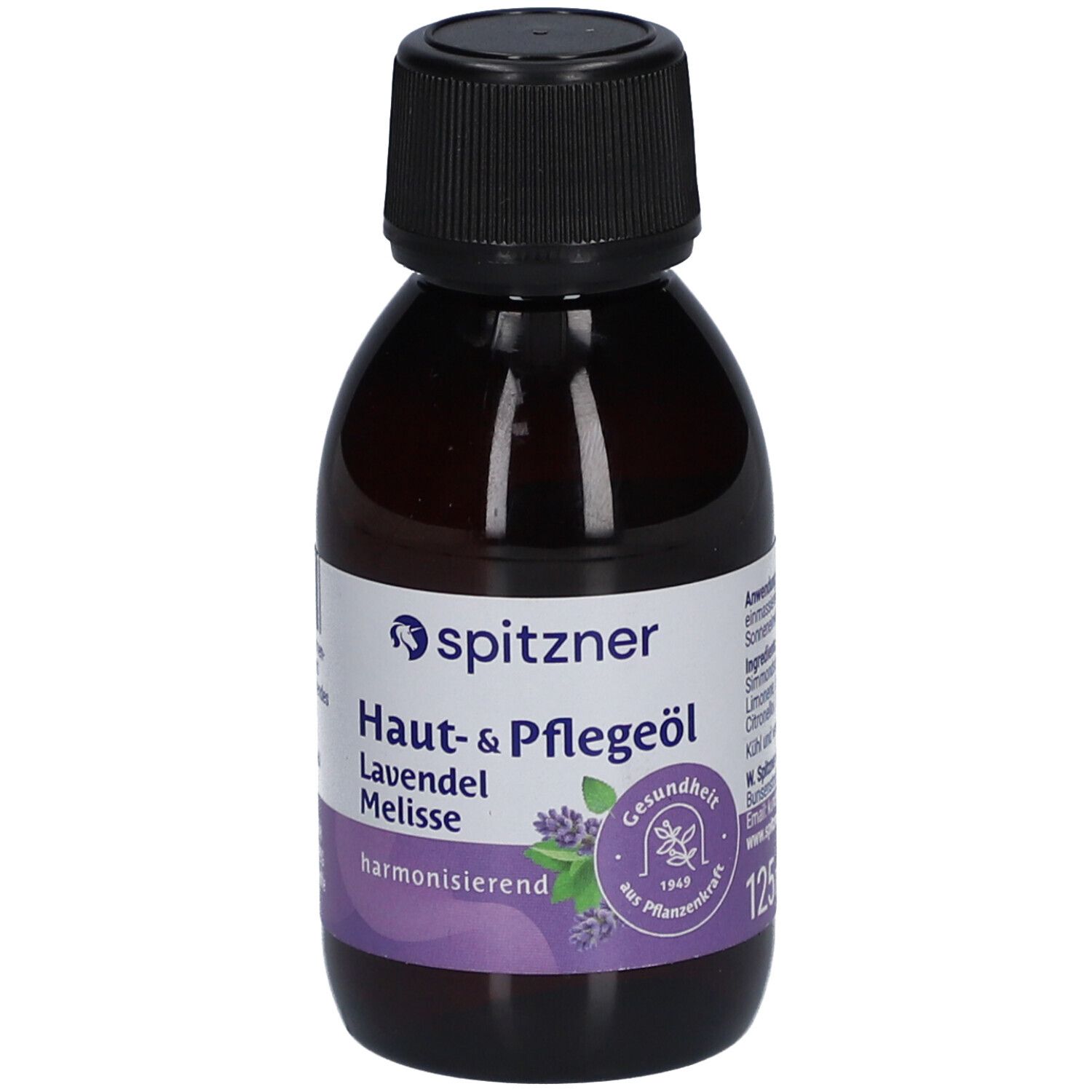 Flacon brun avec bouchon noir. Étiquette Spitzner, Huile de soin Lavande Mélisse, harmonisant.