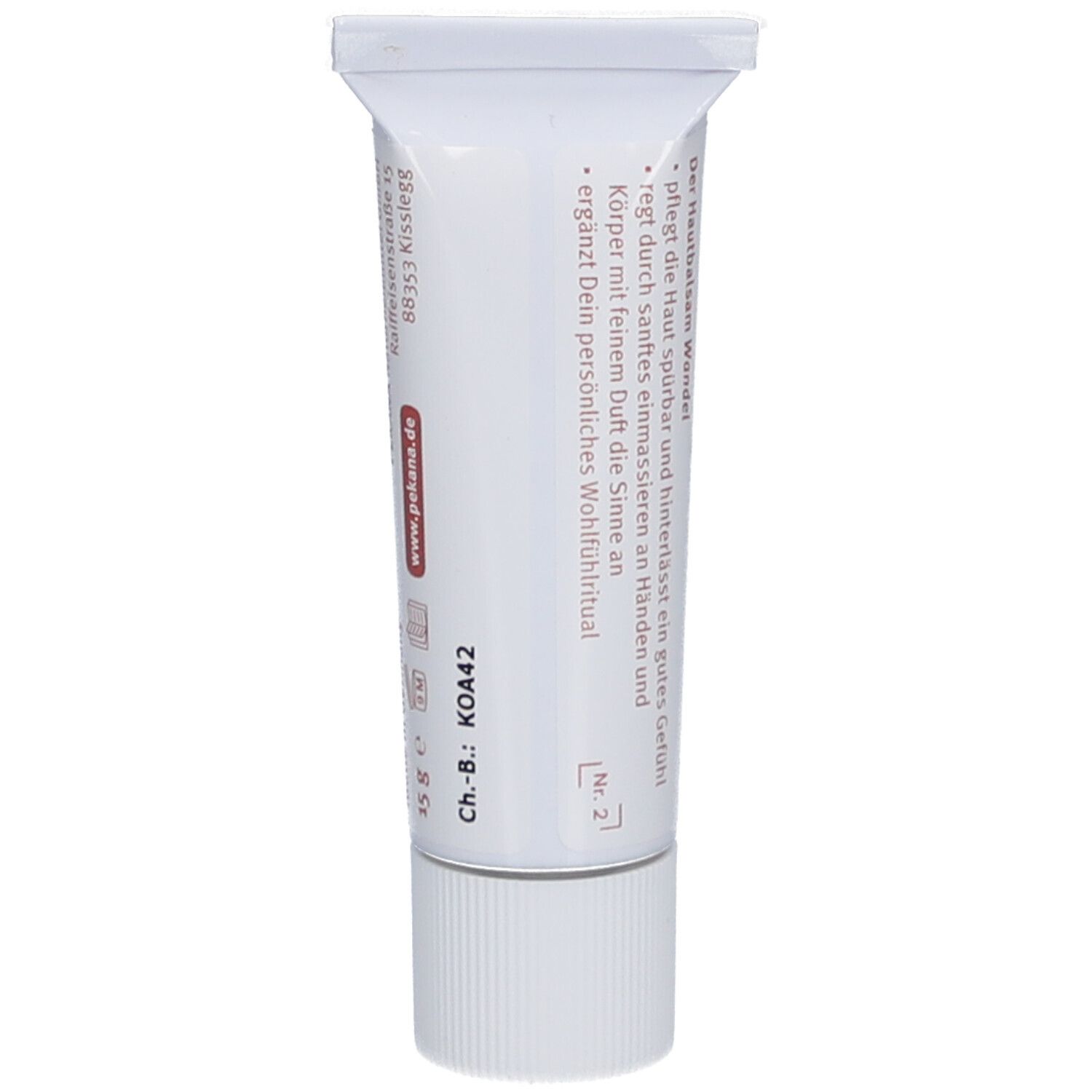 Dos du tube de crème. Texte avec informations sur le produit et adresse du fabricant. Design blanc.