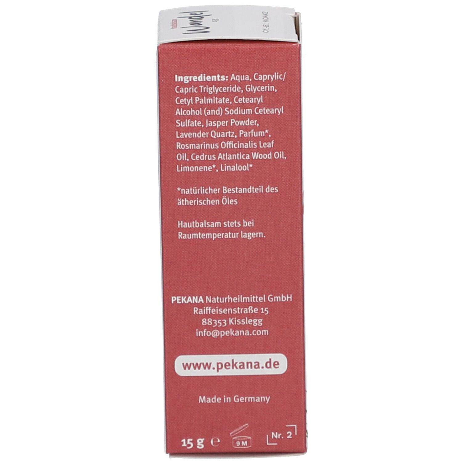 Dos de l'emballage en carton. Liste des ingrédients, adresse du fabricant et autres informations.
