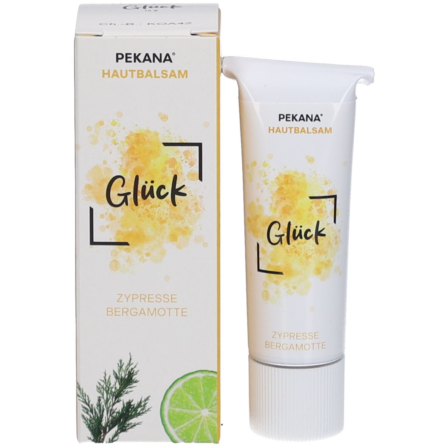 Emballage du produit avec tube. Boîte blanche avec PEKANA Hautbalsam Glück, taches jaunes, texte et illustration.