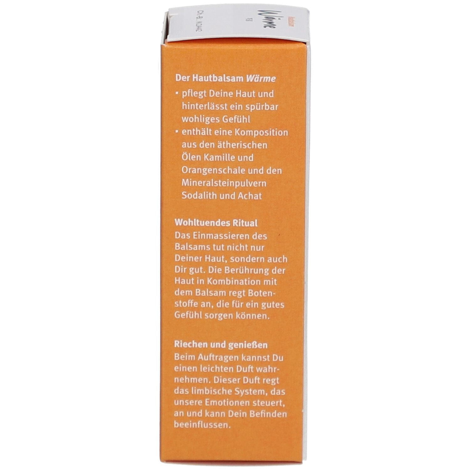 Côté de l'emballage du produit. Description de l'effet et du rituel. Fond orange avec texte blanc.
