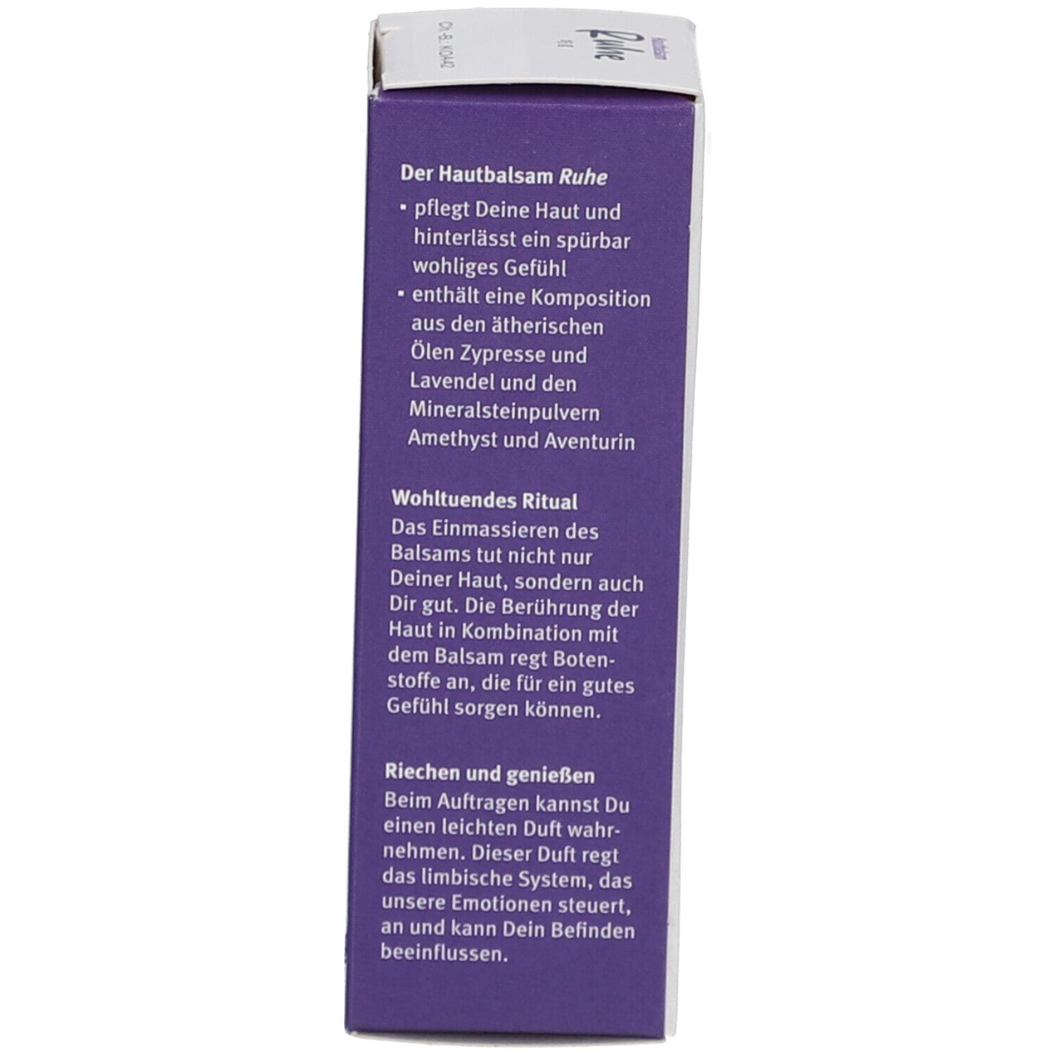 Côté de la boîte avec description du produit. Texte sur l'effet du baume pour la peau et ses ingrédients.