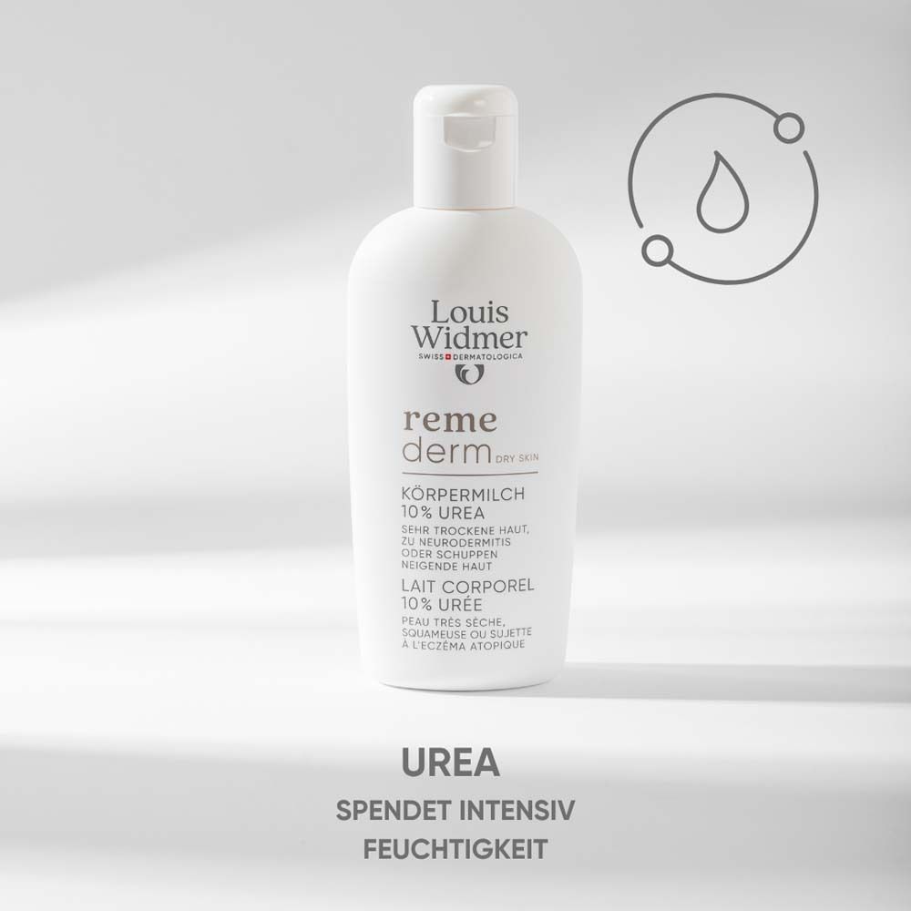 Flacon blanc Louis Widmer remederm Körpermilch 10% Urea. Texte: Körpermilch, 10% Urea, pour peau sèche. UREA hydrate intensément.