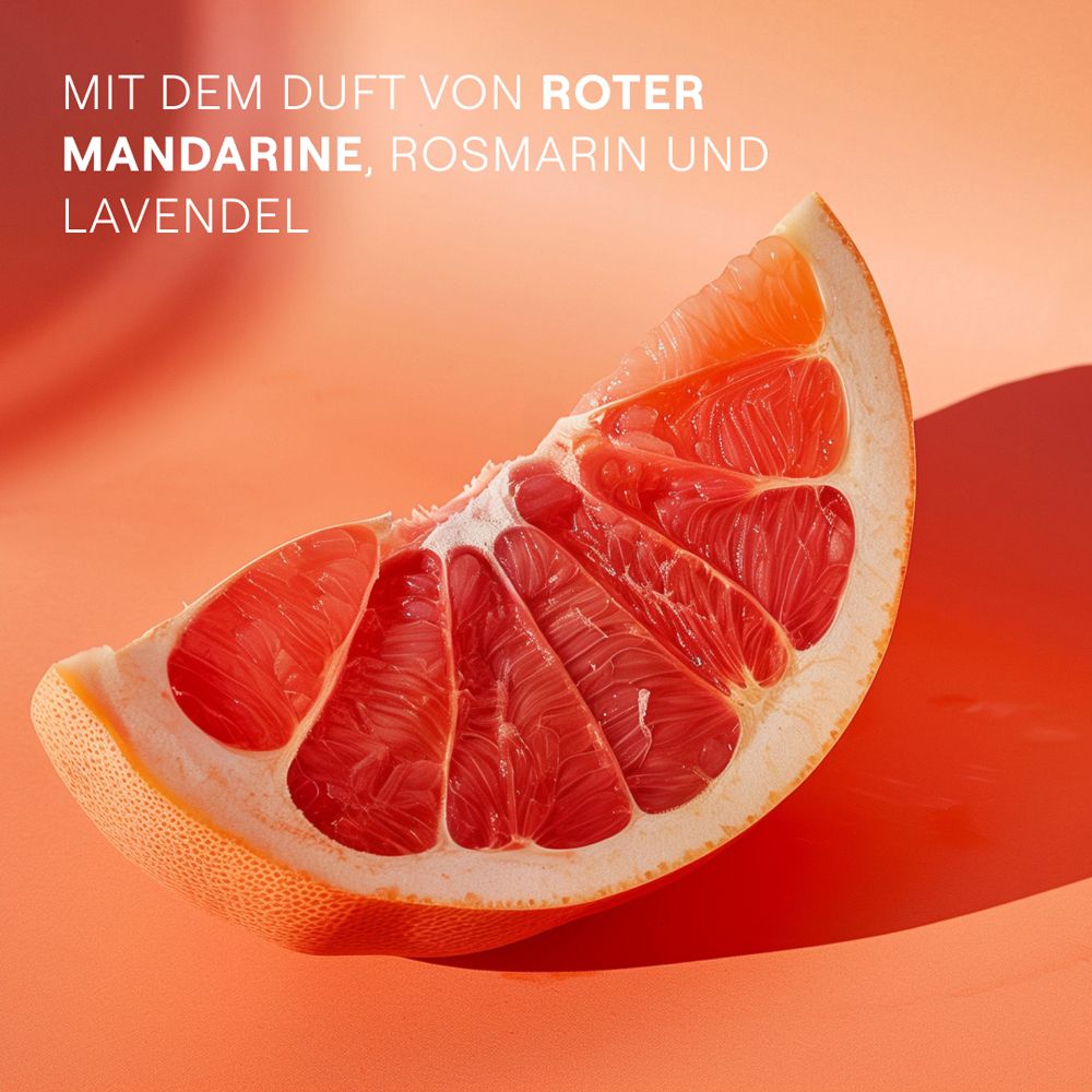 Moitié de pamplemousse sur fond orange. Texte: Avec le parfum de mandarine rouge, romarin et lavande.