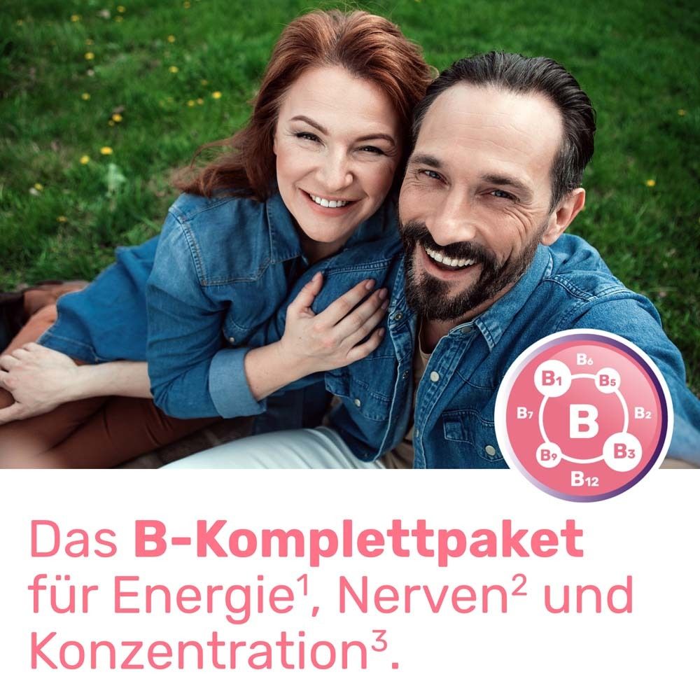 Couple souriant sur une pelouse. Symbole de vitamine B. Texte : Pack complet B pour énergie, nerfs et concentration.