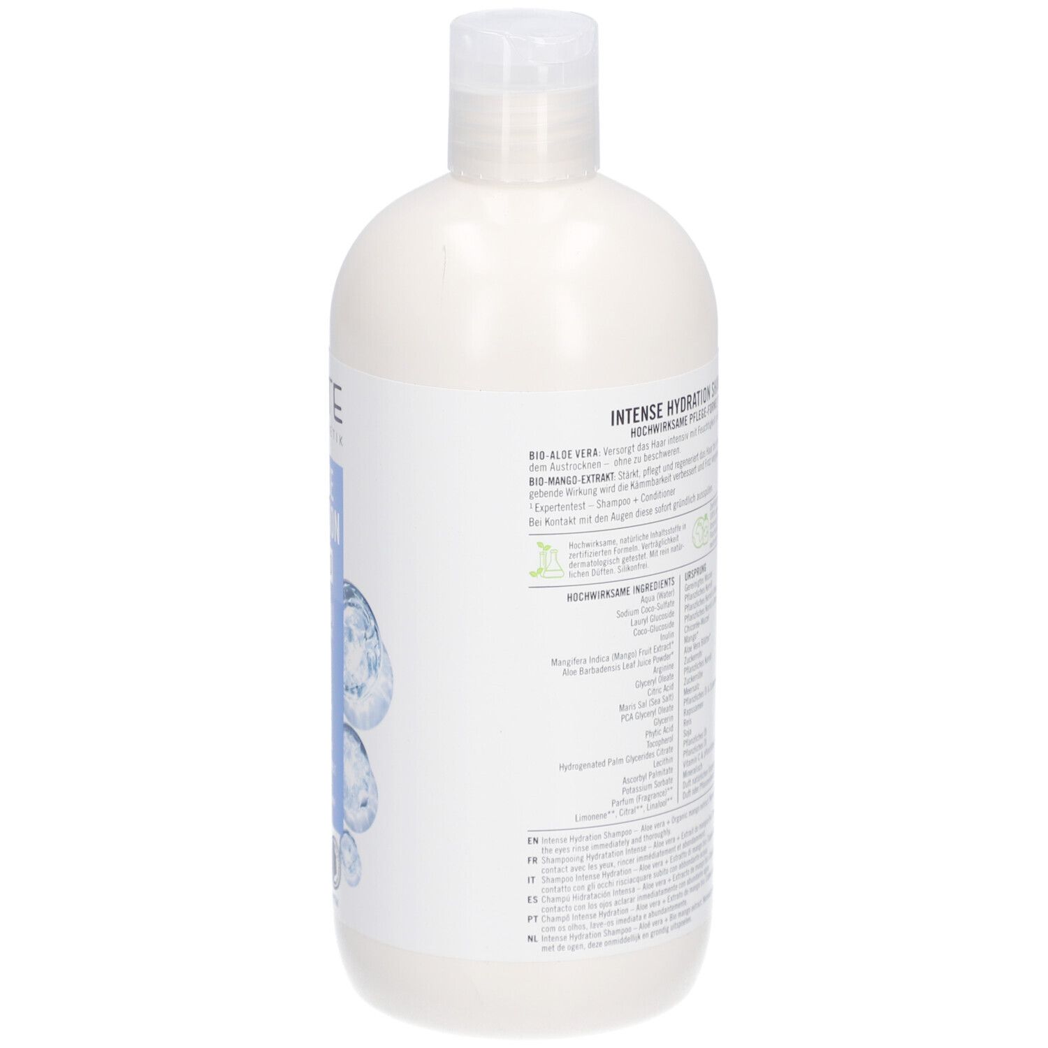 Rückseite der Shampoo-Flasche. Text: Inhaltsstoffe, Anwendungshinweise. Bio-Siegel, Vegan-Siegel.