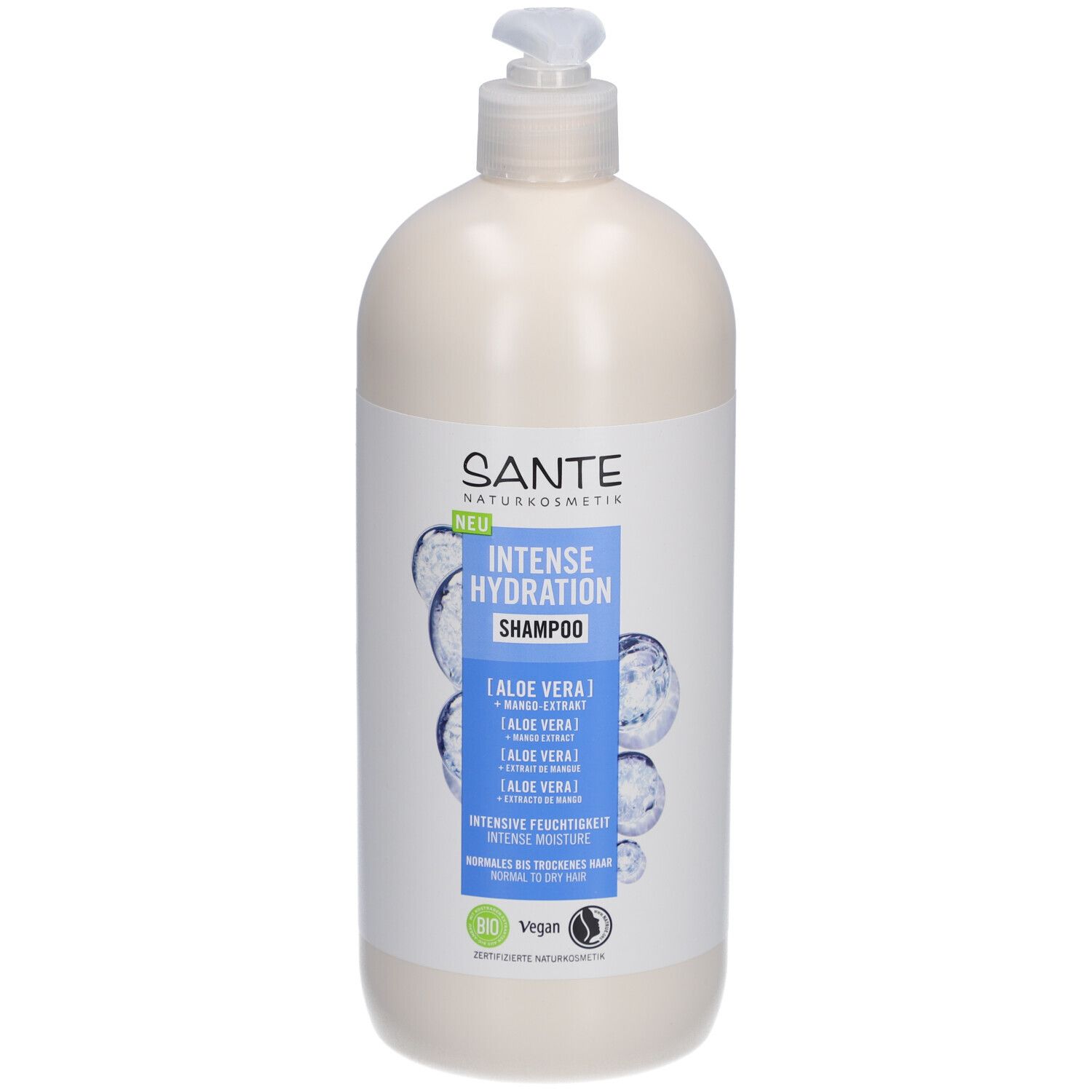 Flacon de shampooing beige avec pompe. Étiquette avec nom du produit et ingrédients. Labels vegan et bio.