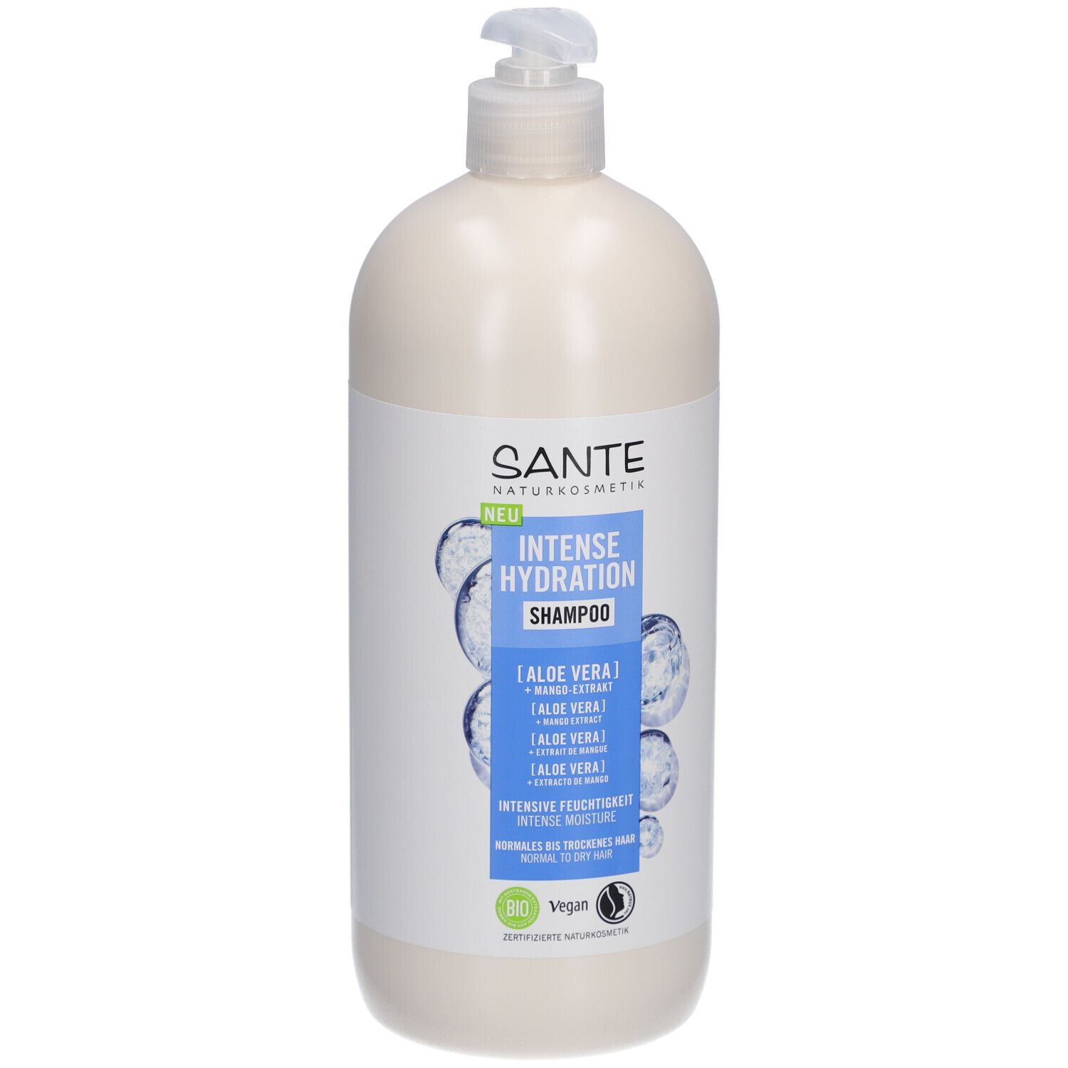 Flacon de shampooing beige avec pompe. Étiquette avec nom du produit et ingrédients. Labels vegan et bio.