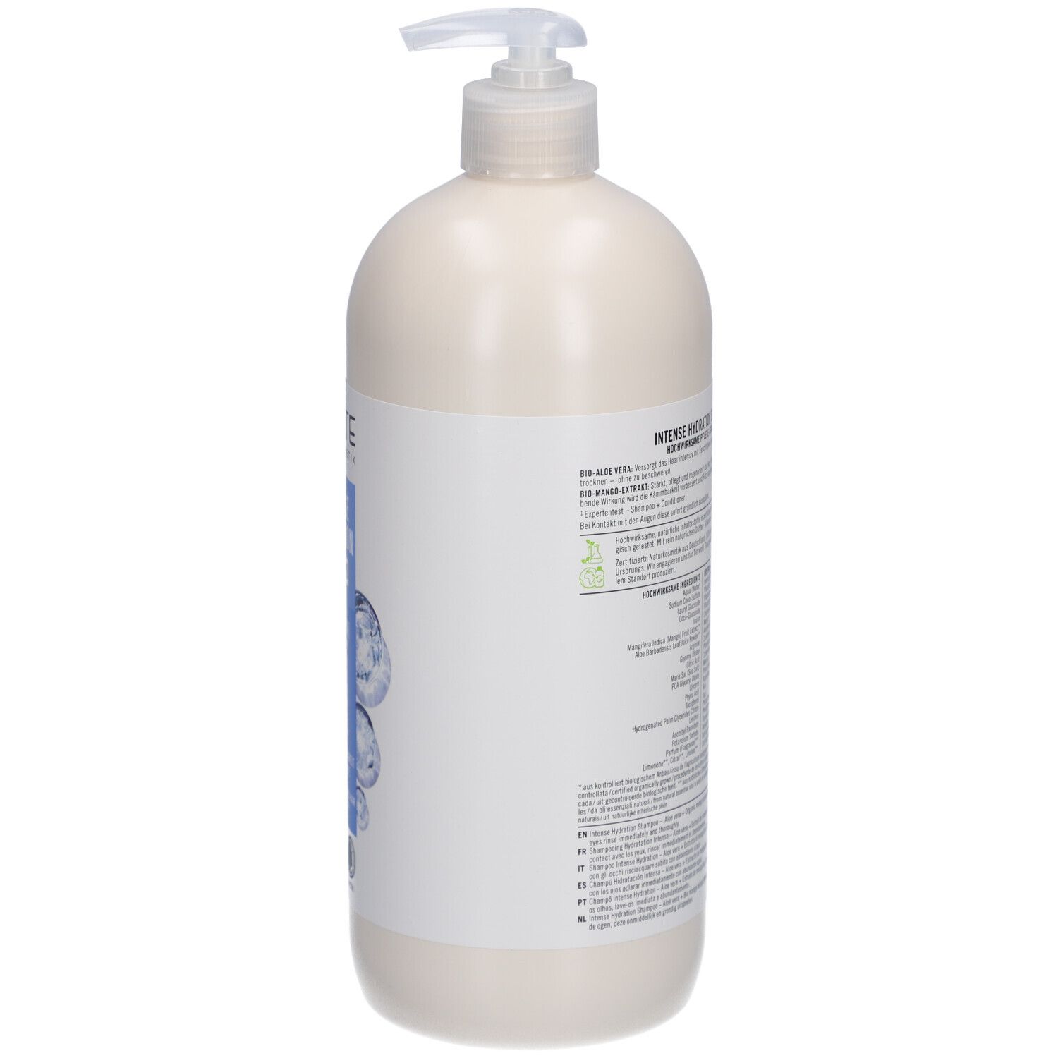 Vue arrière du flacon de shampooing. Étiquette avec informations produit, ingrédients et fabricant. Label vegan.