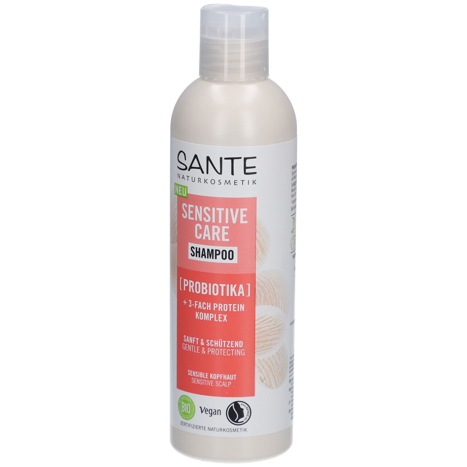 Shampooing SANTE Sensitive Care. Bouteille de shampooing blanc avec bouchon blanc et étiquette rouge. Texte: Sensitive Care Shampoo, [Probiotika].