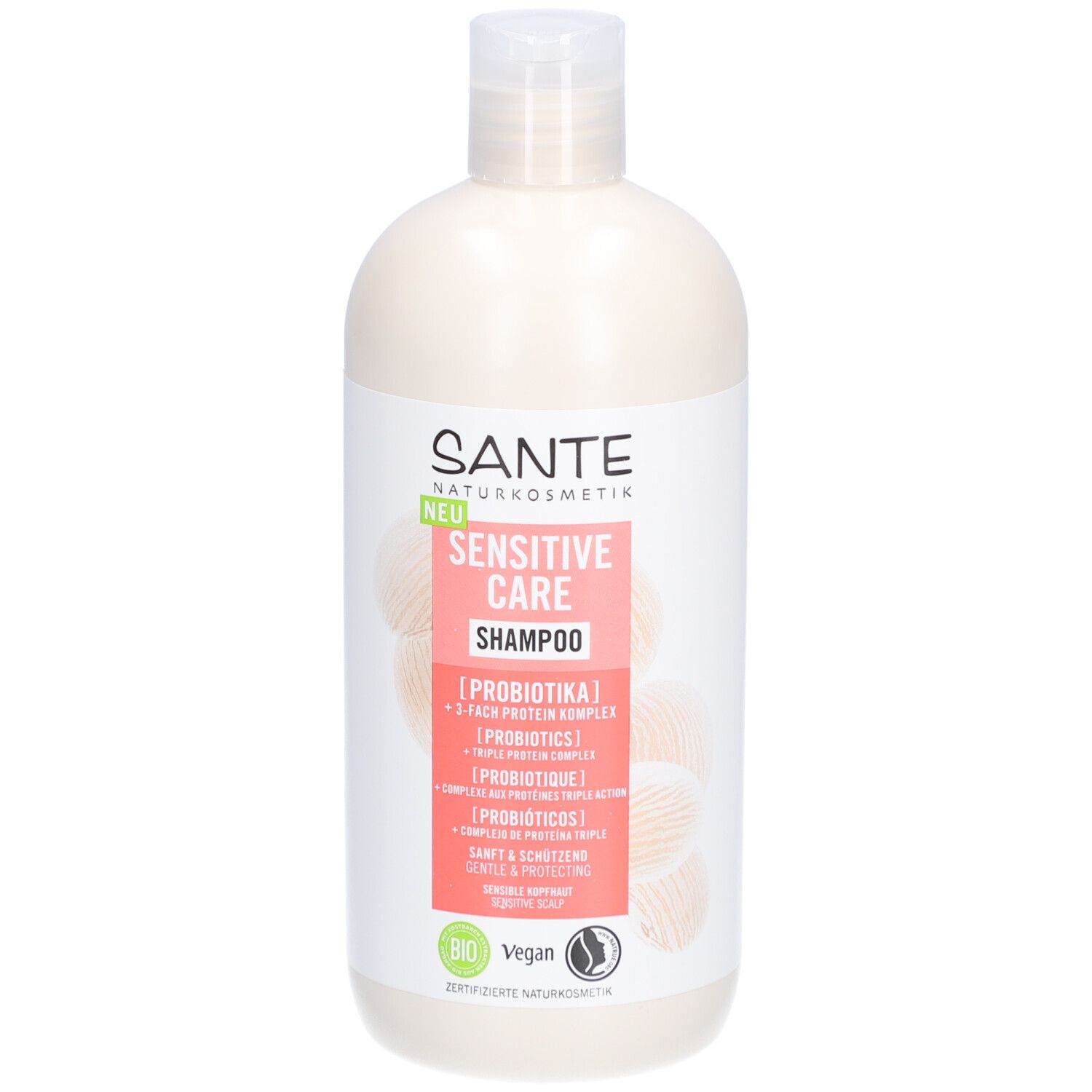Flacon de shampooing beige avec bouchon blanc. Inscription: SANTE Sensitive Care Shampoo. Avec label Bio et logo Vegan.