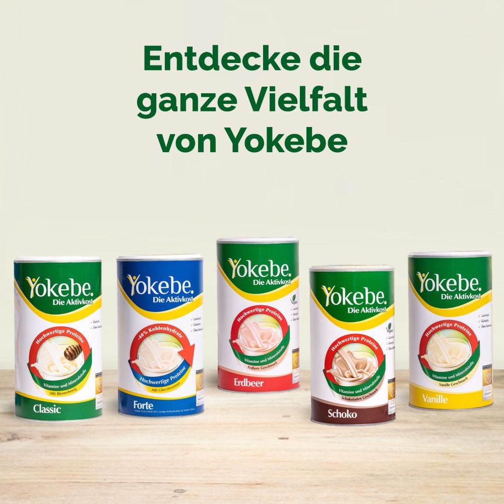 Différentes boîtes Yokebe : Classic, Forte, Fraise, Chocolat, Vanille. Sur fond en bois.