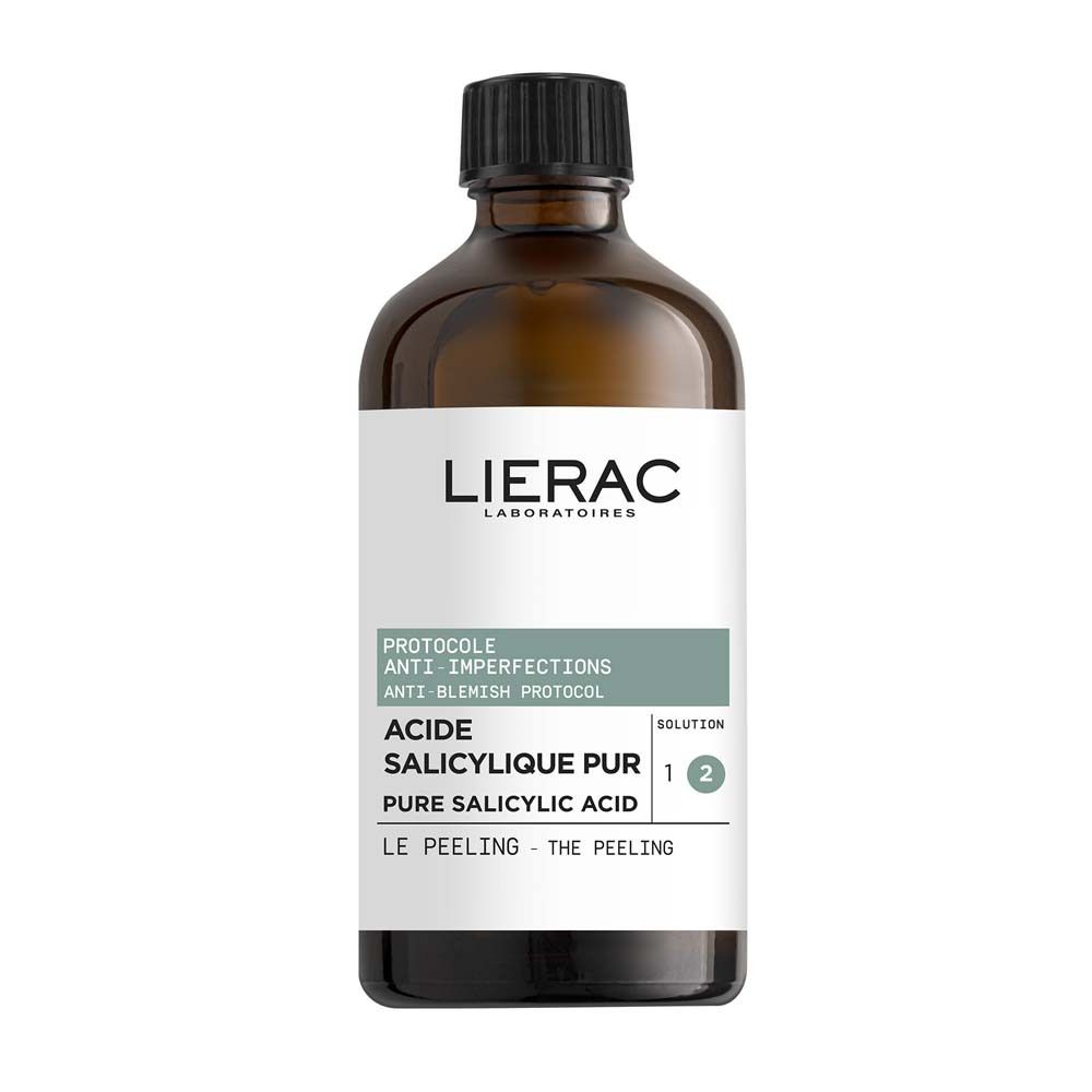 Flacon en verre brun avec bouchon noir. Étiquette LIERAC et informations produit: Acide Salicylique Pur.