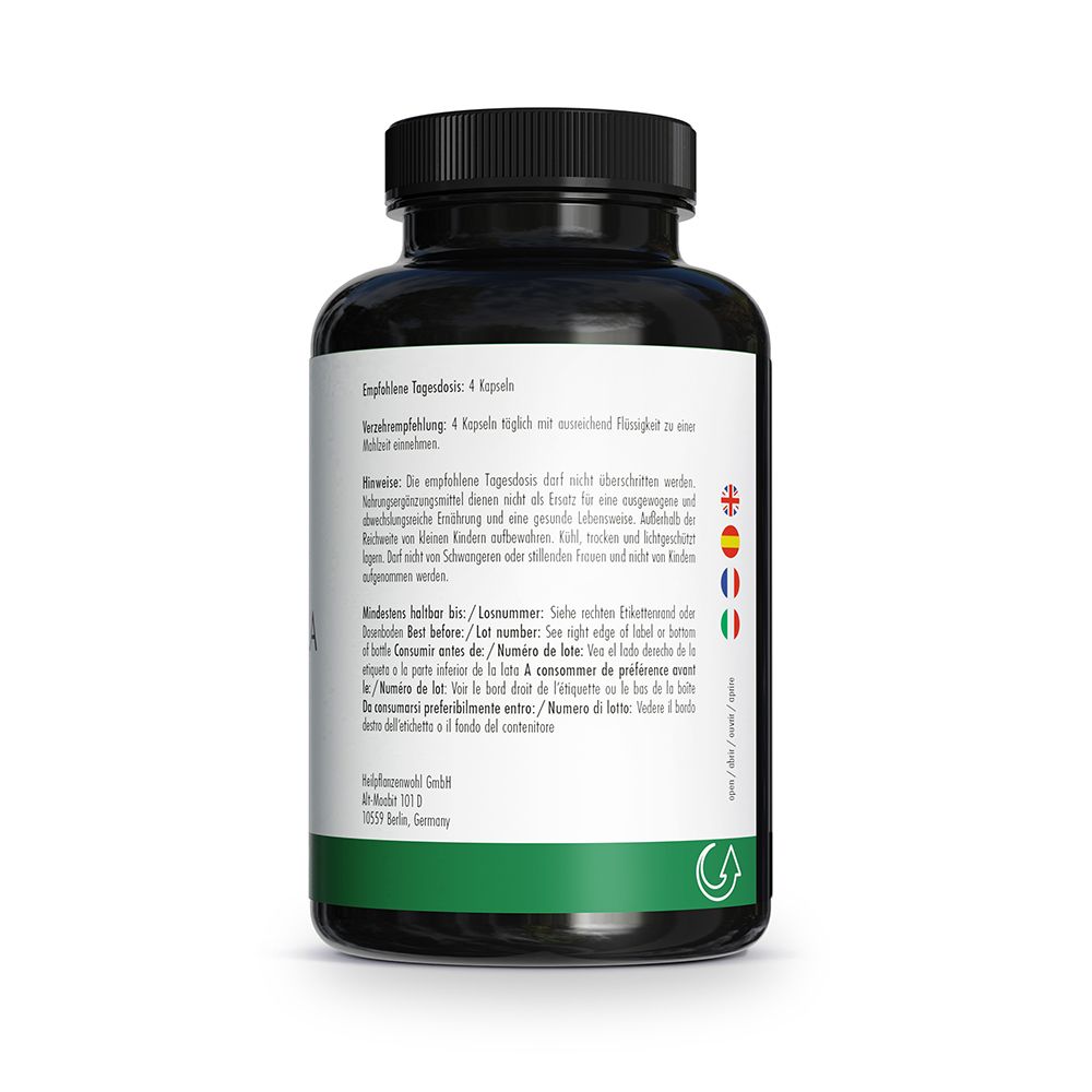 Arrière d'un flacon de Chlorelle avec recommandation de dosage et avertissements en plusieurs langues.