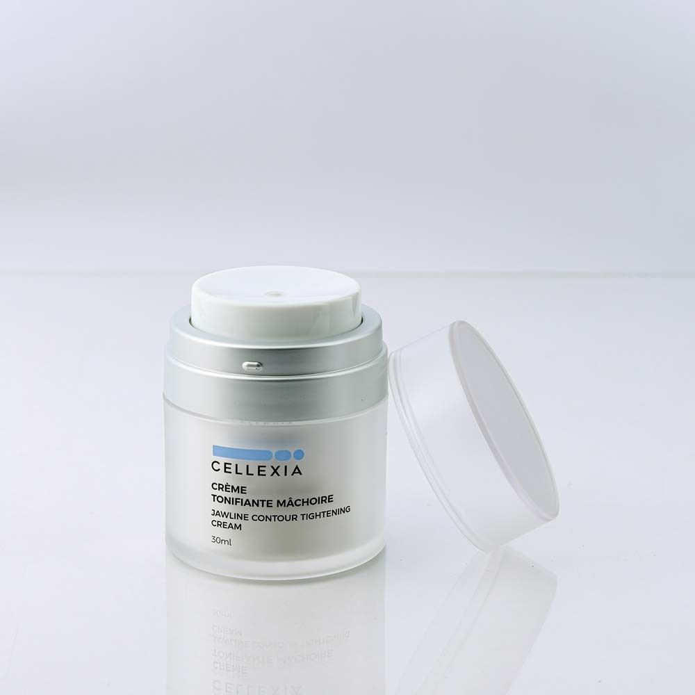 Creme-Tiegel mit geöffnetem Deckel. Aufschrift: Cellexia, Crème Tonifiante Mâchoire, Jawline Contour Tightening Cream. 30ml.