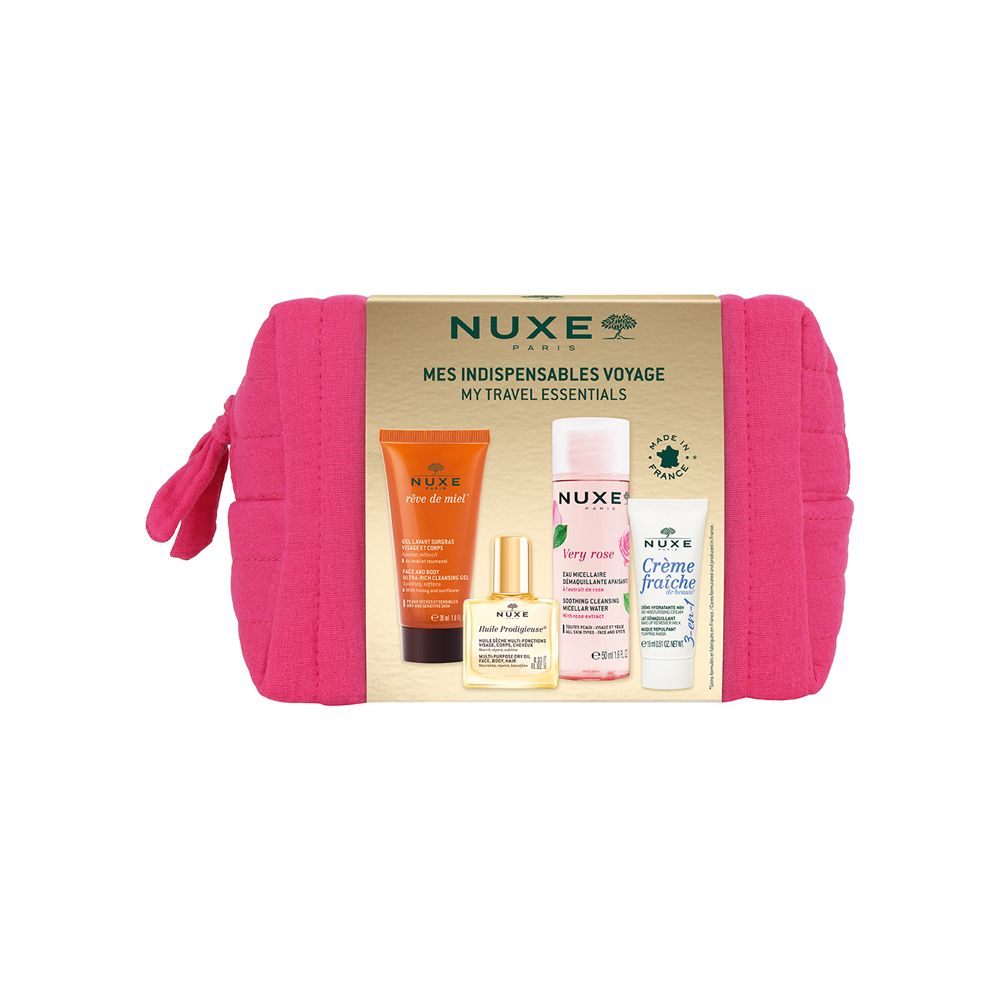 Pinkfarbene Kosmetiktasche mit Produkten. Goldfarbene Verpackung mit Produktnamen. NUXE-Logo sichtbar.