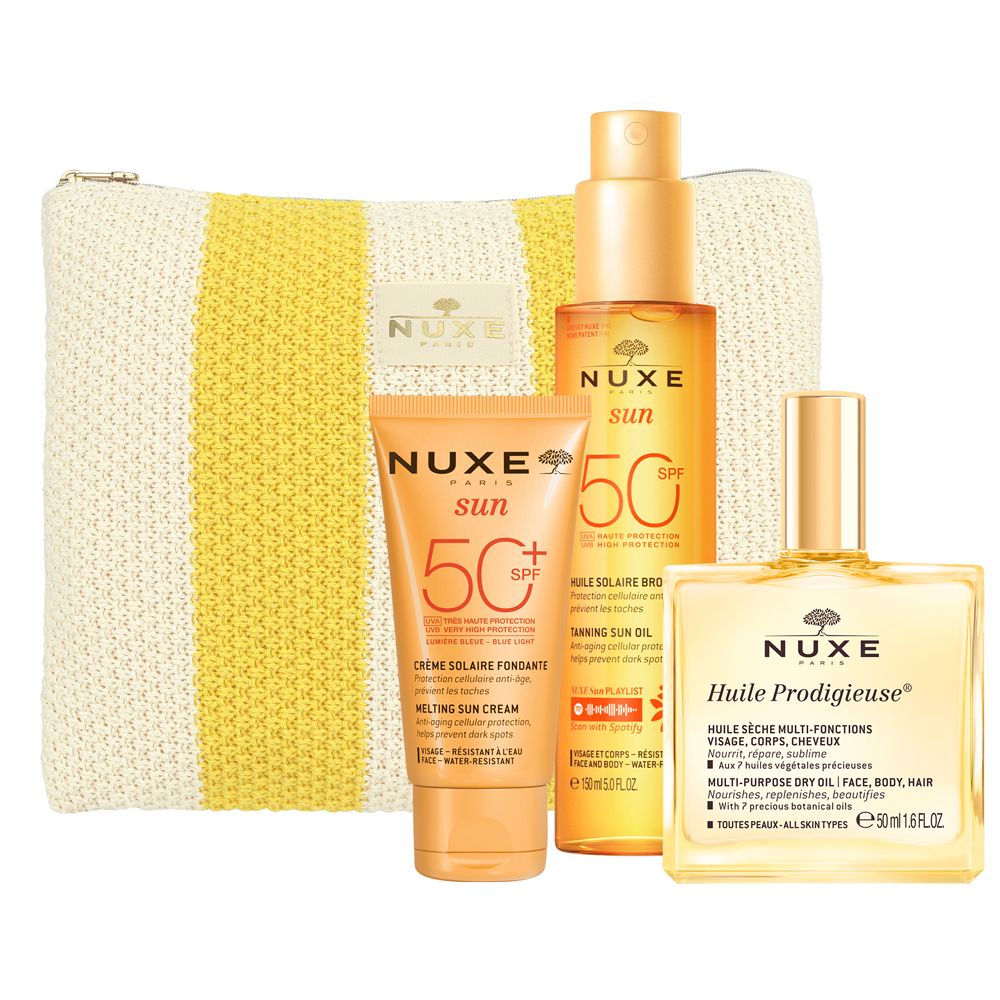 Trousse rayée jaune et blanche, huile solaire, crème solaire et flacon d'huile. Tous les produits portent le logo.