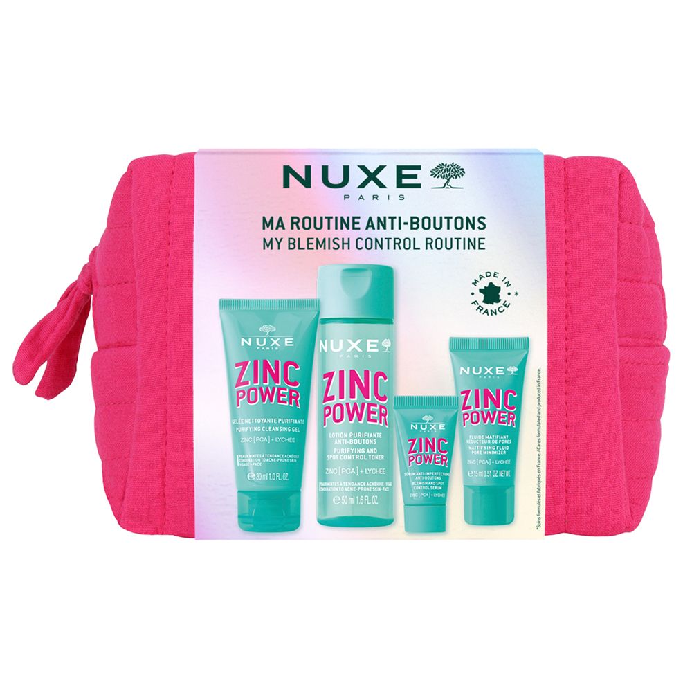 Set mit vier Produkten in einer pinkfarbenen Kosmetiktasche. Auf der Verpackung steht "NUXE PARIS" und "ZINC POWER".