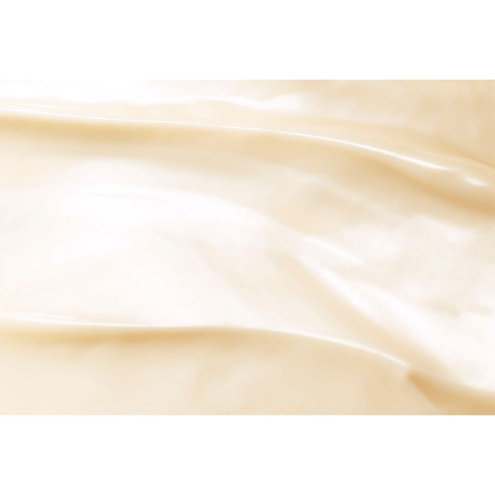 Gros plan sur la texture de la crème. Crémeuse, brillante.