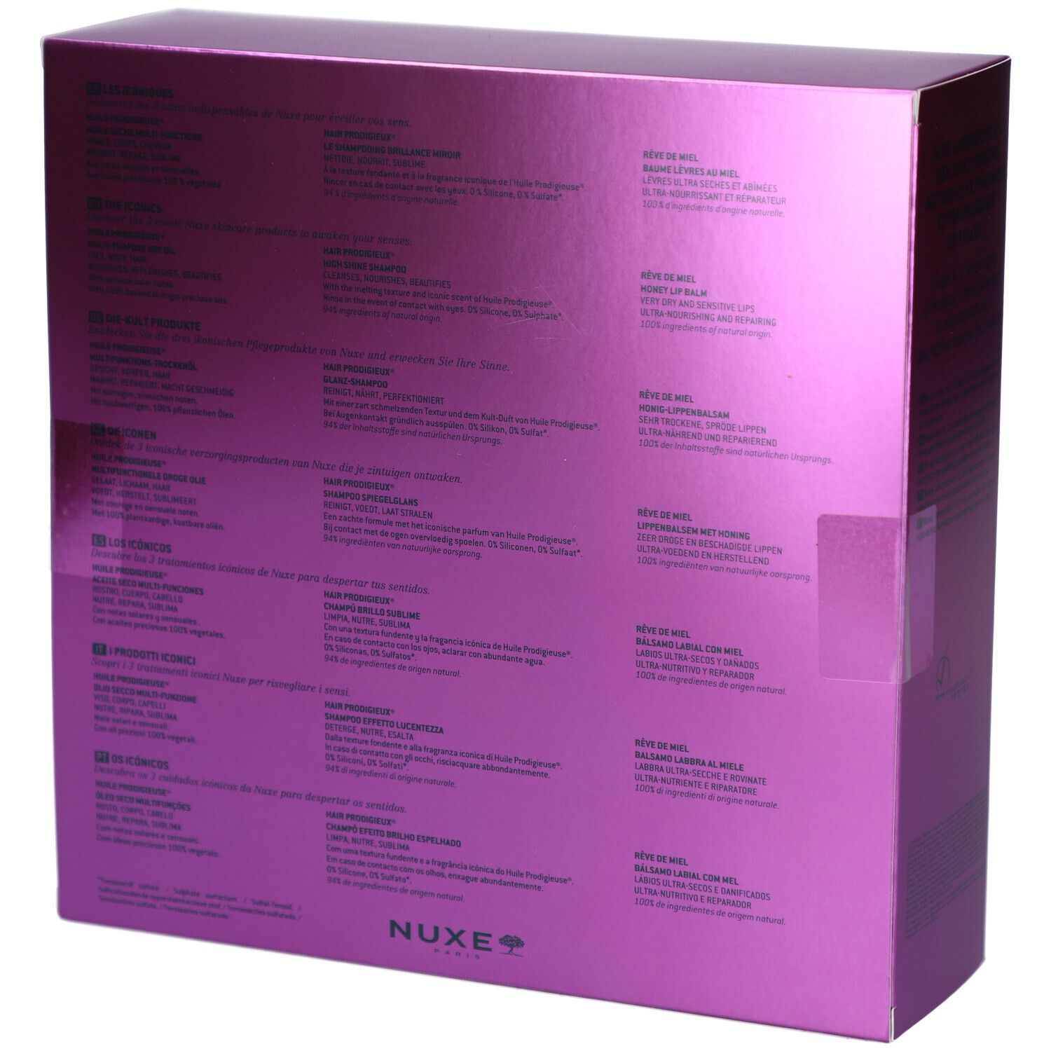 Rückseite der lila Geschenkbox. Text in mehreren Sprachen. Der Markenname NUXE ist sichtbar. "Made in France" ist ebenfalls sichtbar.