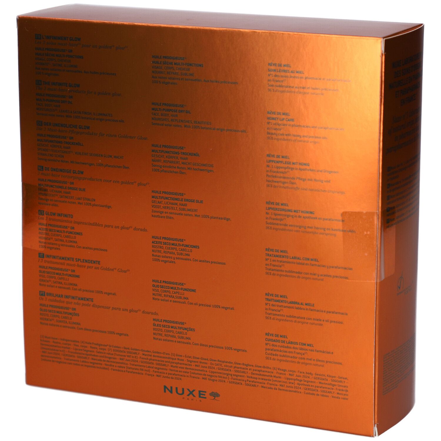 Dos du coffret cadeau doré. Texte multilingue. Logo NUXE en bas à droite.